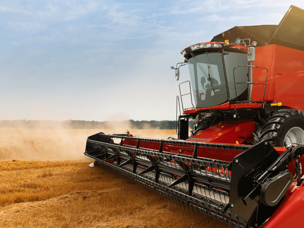 image of a combine harvest equipment in the field