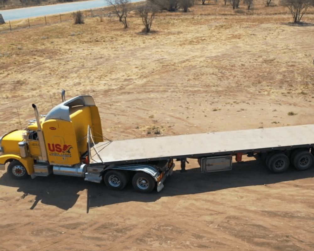 image of U.S. truck training on dirt for seasonal driving jobs