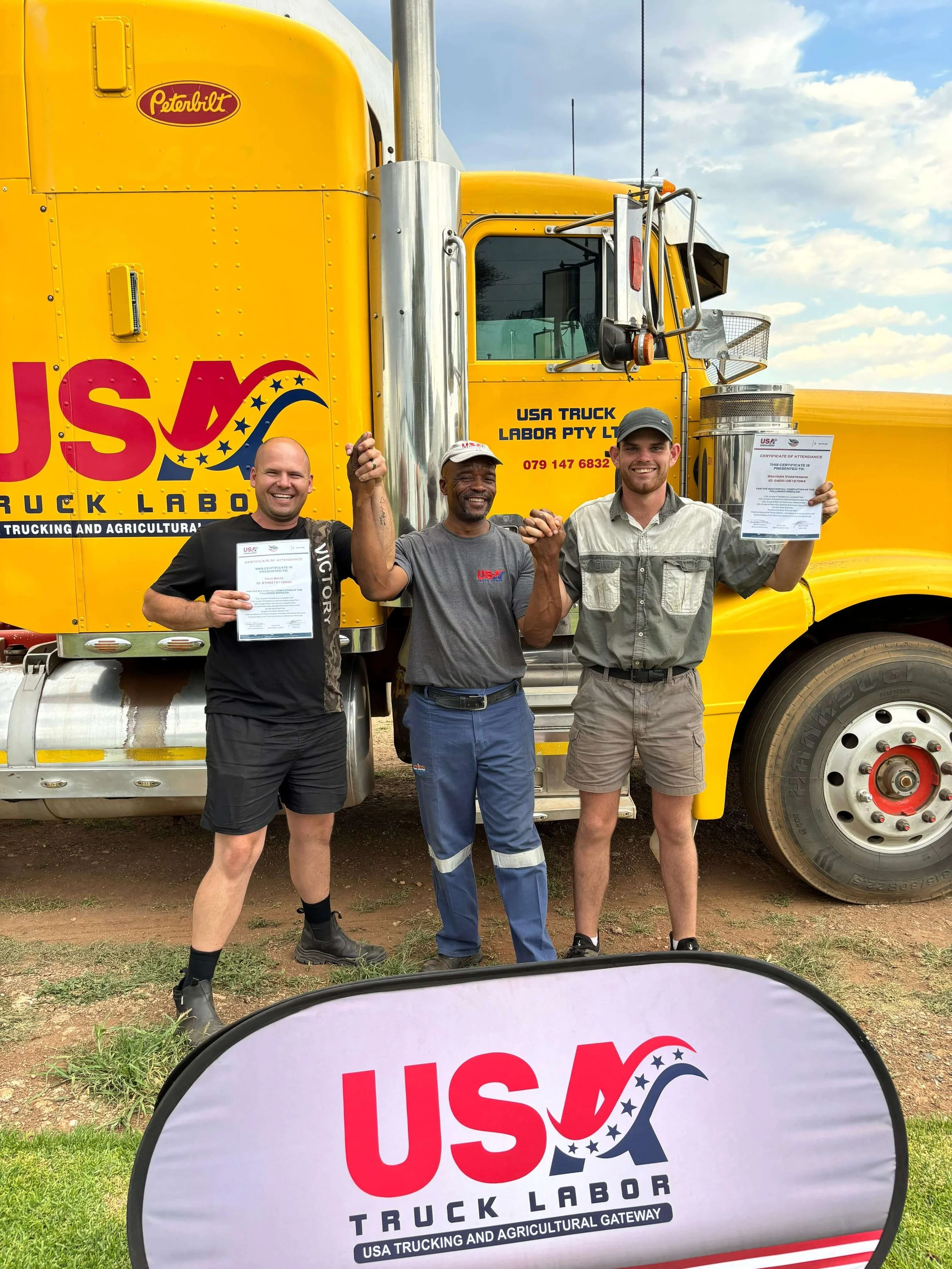 truck driving school graduates with their certificates for h2a training 