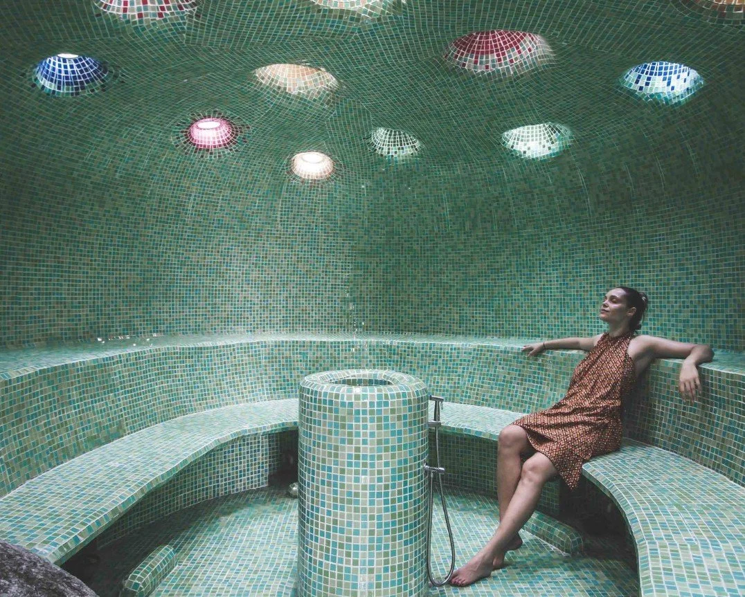 Woman relaxing in a hammam