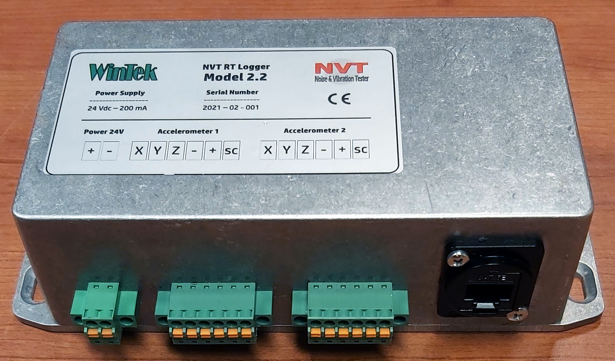NVT RT Logger Model 2.2 electronic device with connectors and labeling for accelerometers and power supply.