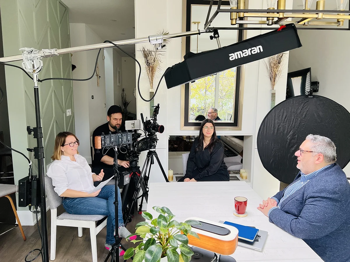 Behind the scenes with the Iceberg Media Productions team conducting a testimonial interview for their client Coraltalk's video production in Toronto.