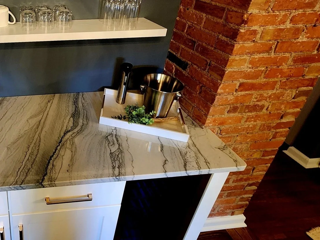 We&rsquo;re not quite ready to open the farmhouse doors just yet, but we already know this little spot will be a favorite. Tucked against the original brick, the wet bar feels like the perfect blend of old character and new comforts. With the wine fr