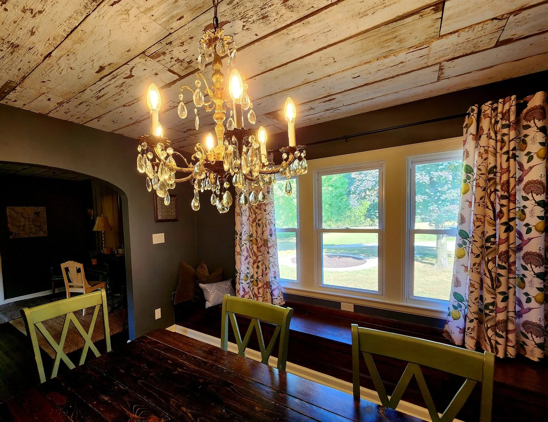 There&rsquo;s something special about gathering around a farmhouse table. In this dining room, with light streaming in through the windows and the chandelier casting a gentle glow, meals turn into memories. Whether it&rsquo;s a quiet morning coffee, 