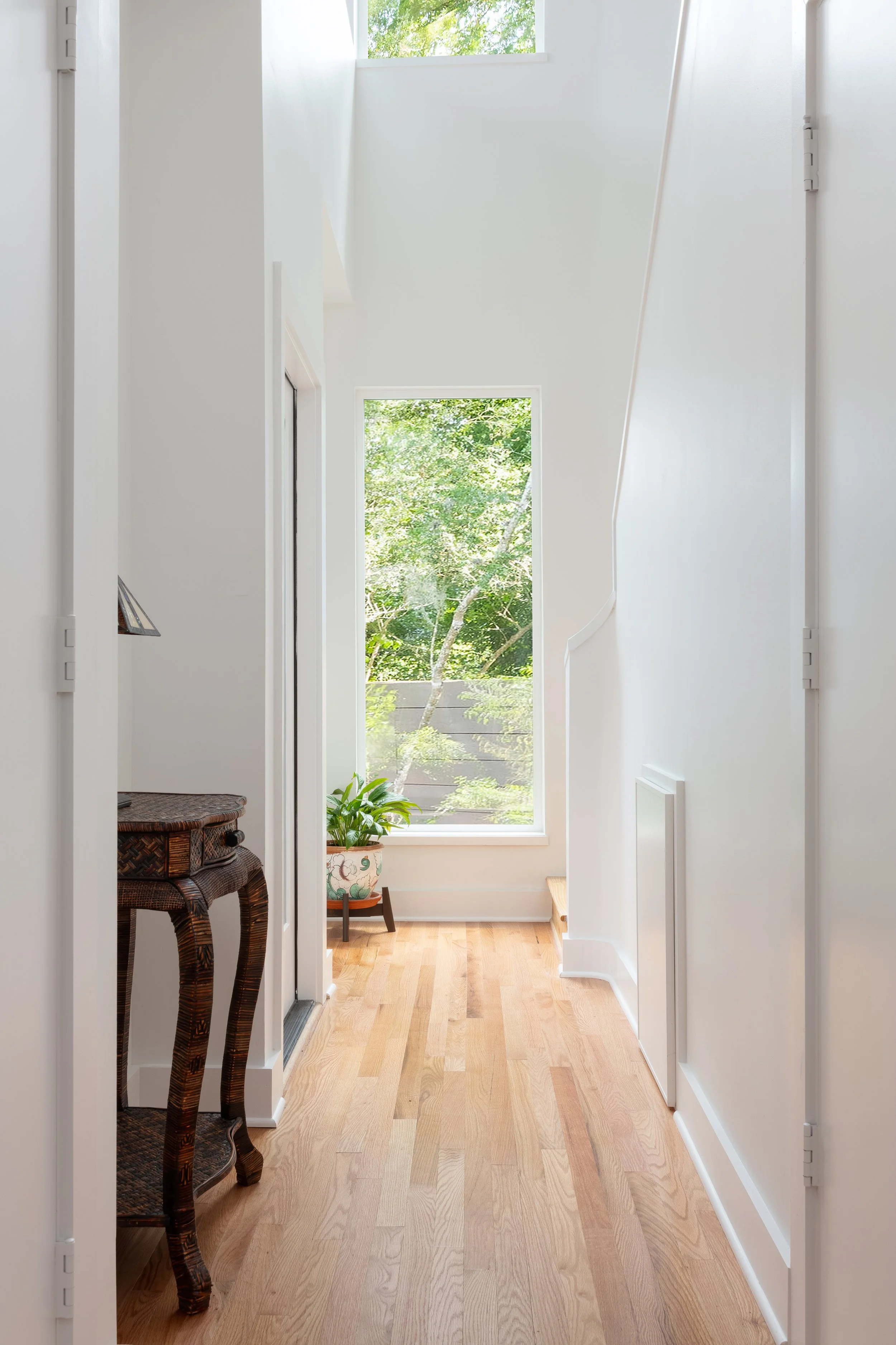Bright hallway with wooden floor