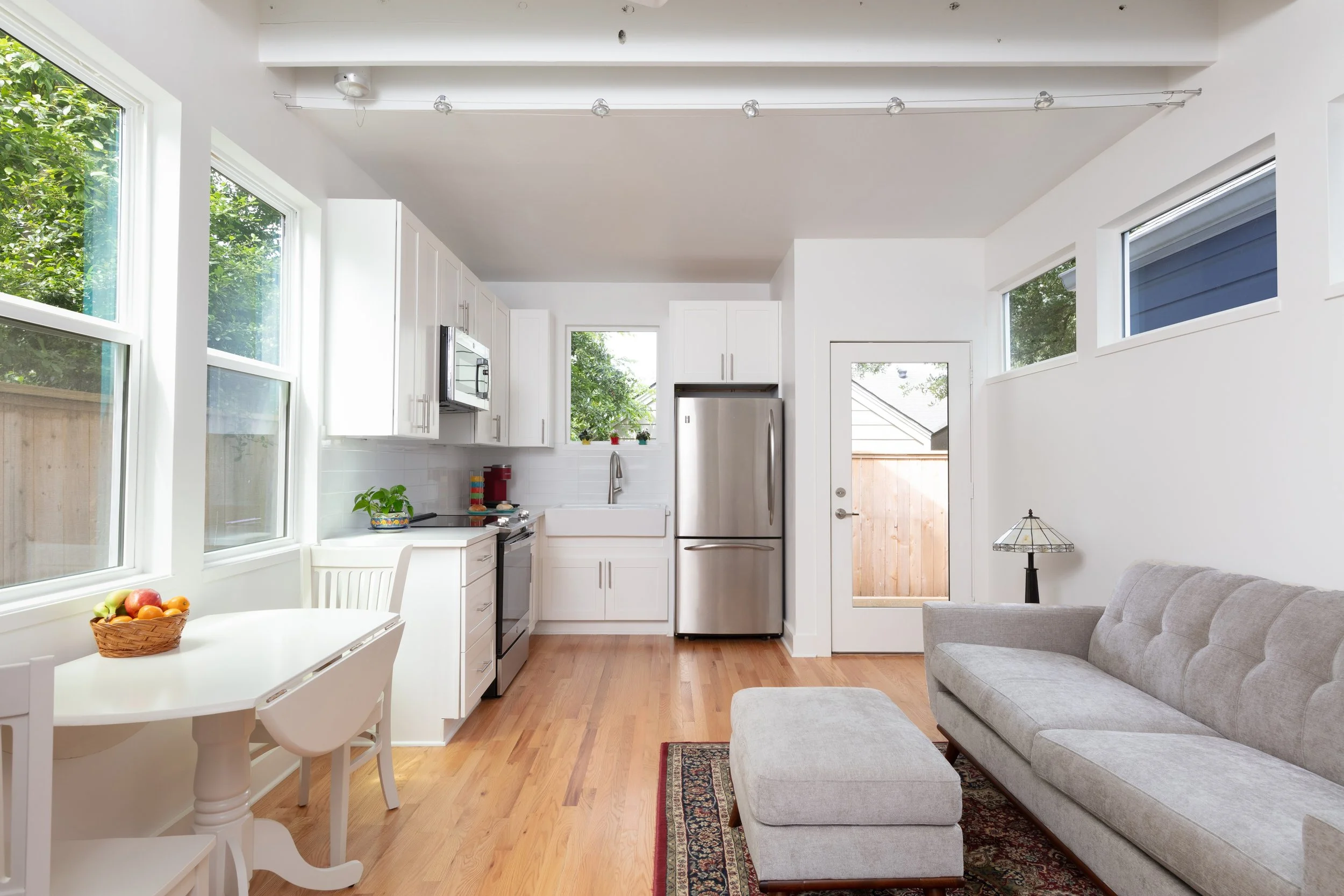 Living room with kitchen at the back