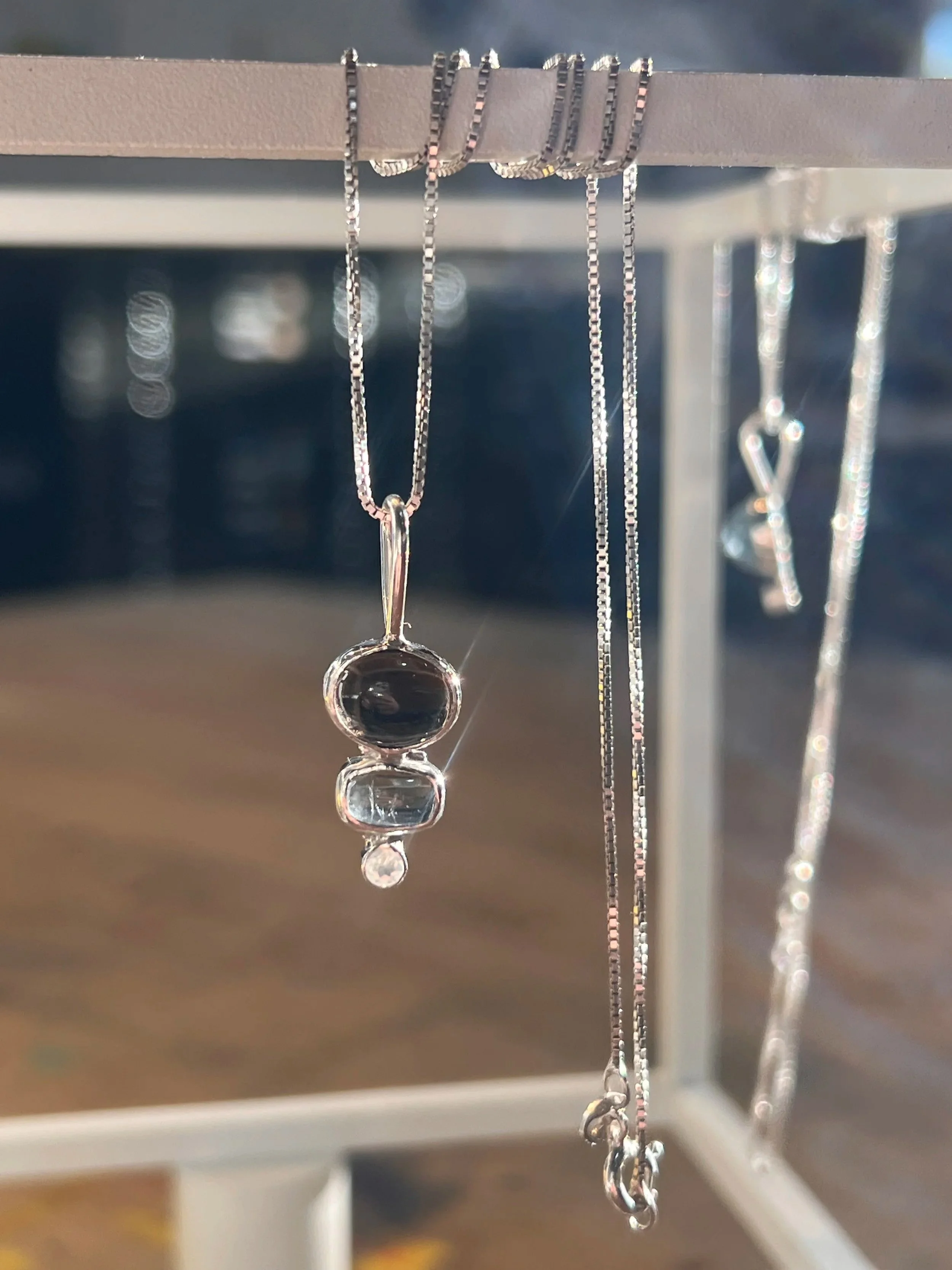 Three stone pendant