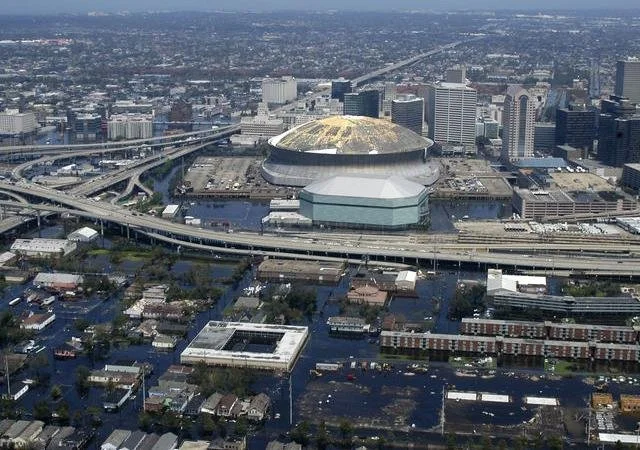Aerial view of New Orleans following Hurricane Katrina showing the Superdome and surrounding neighborhoods underwater