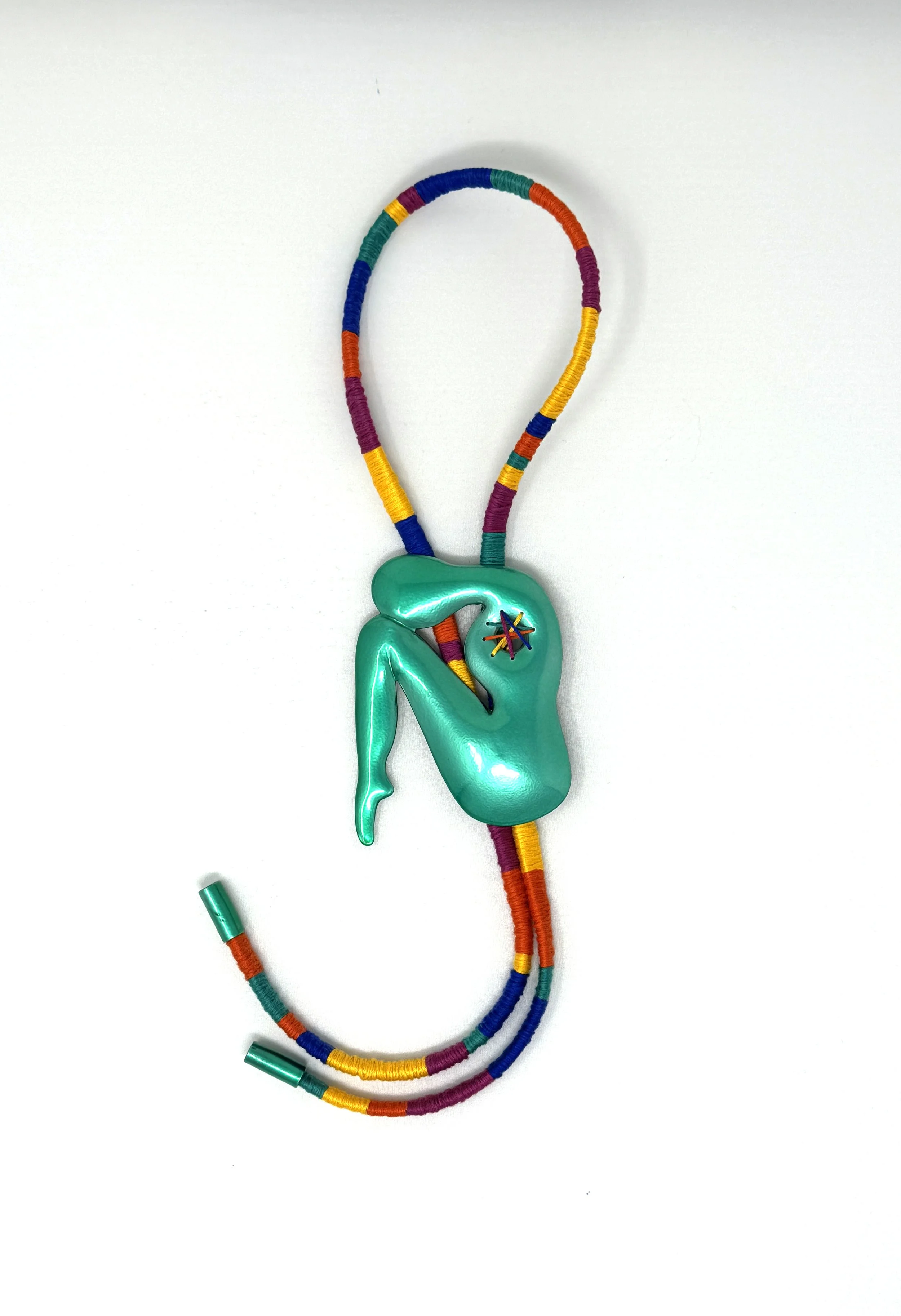 Reframing Grief Bolo, 2025, copper, powder coat, leather, embroidery thread, 18" x 3.5"