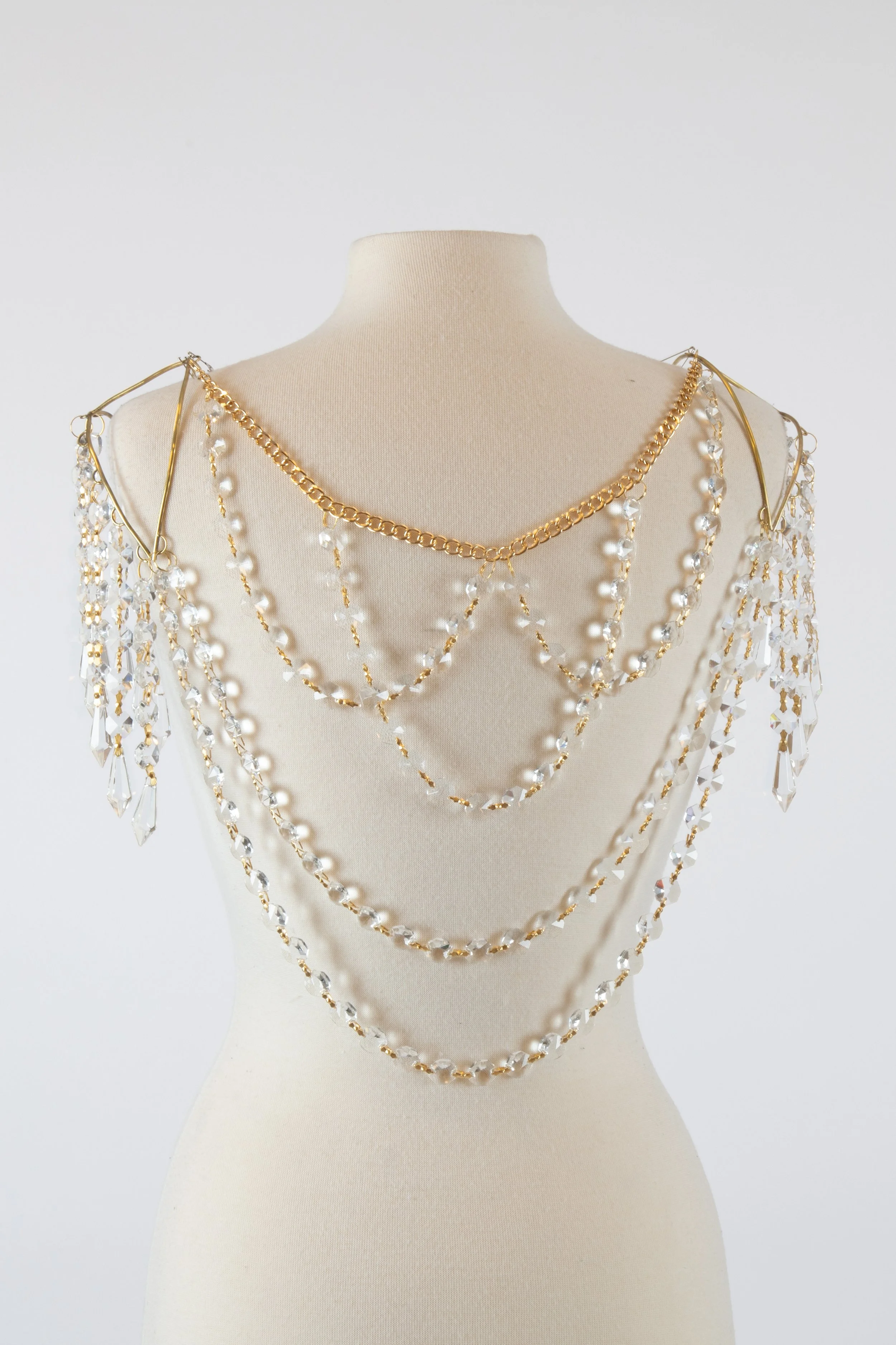 Crystal Cape, 2022, brass, unknown metal, chandelier crystals