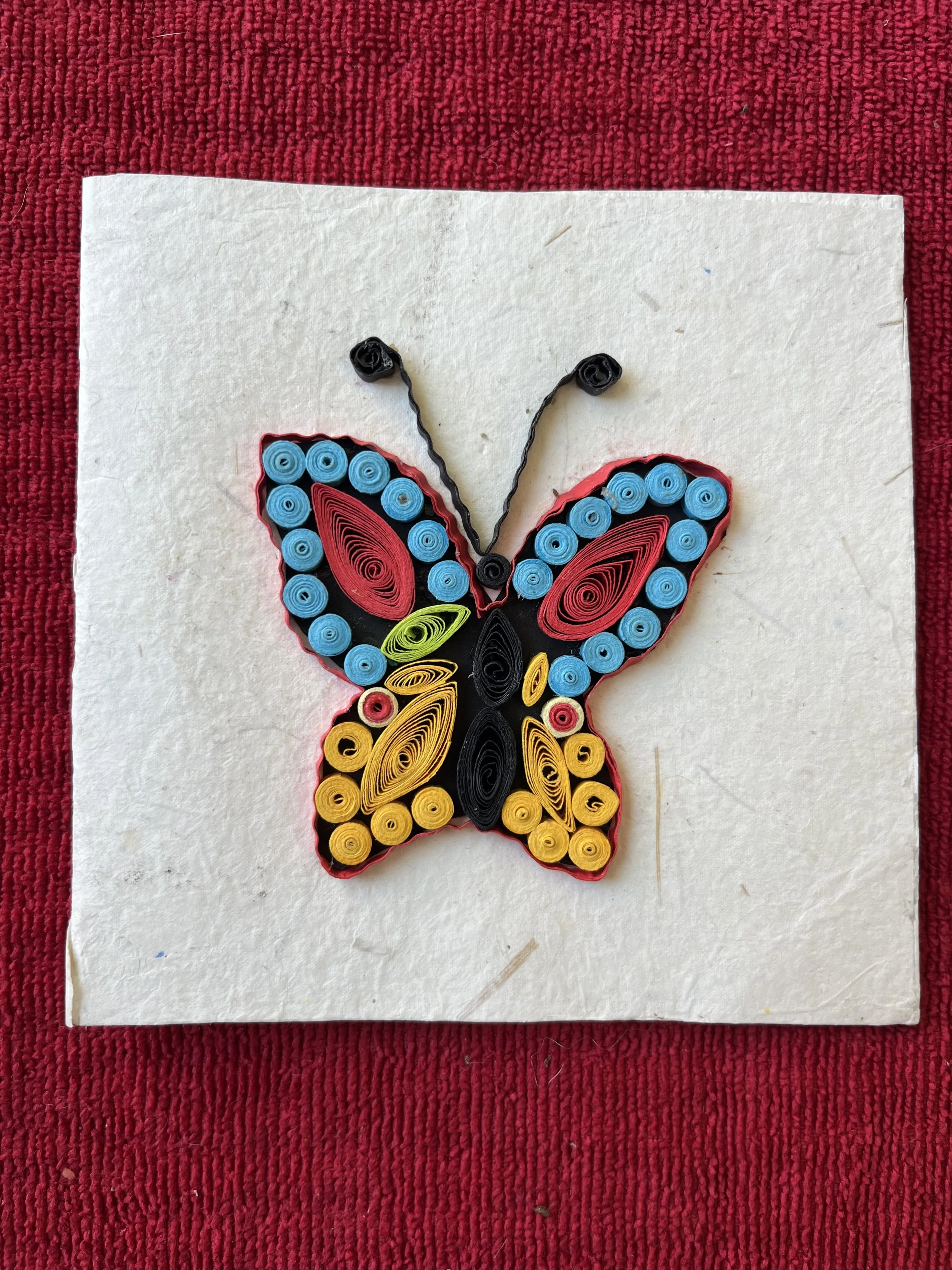 Butterfly blue, yellow, red.jpg