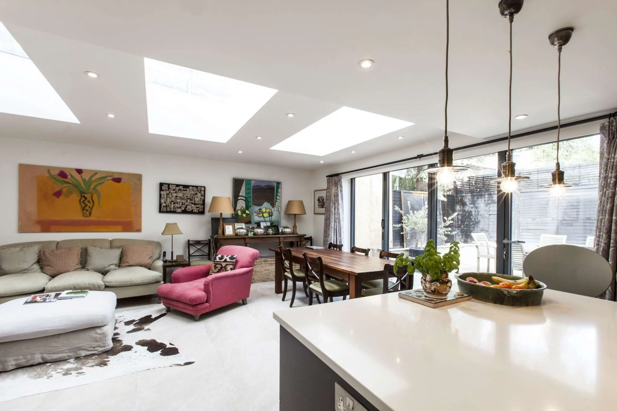25 — open kitchen and living room under rooflights