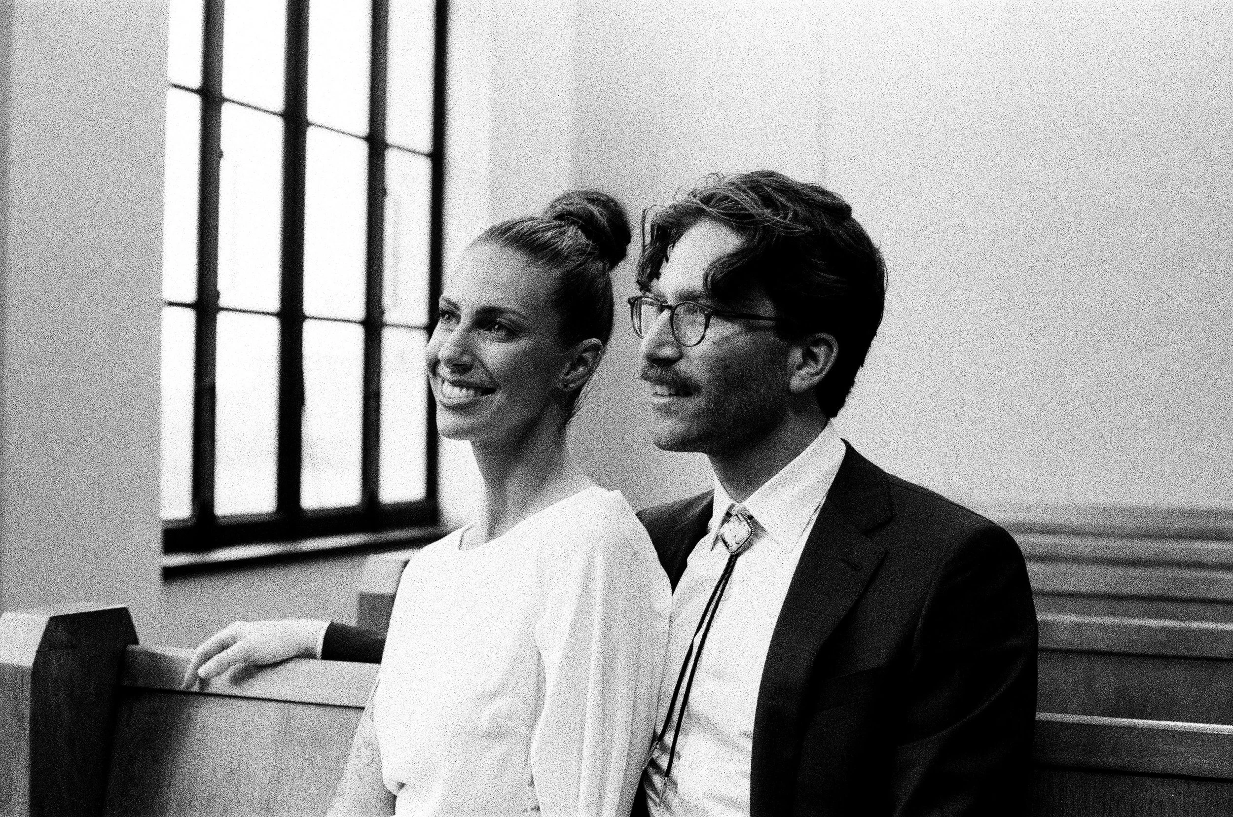 Black and white photo of couple at courthouse elopement in Austin