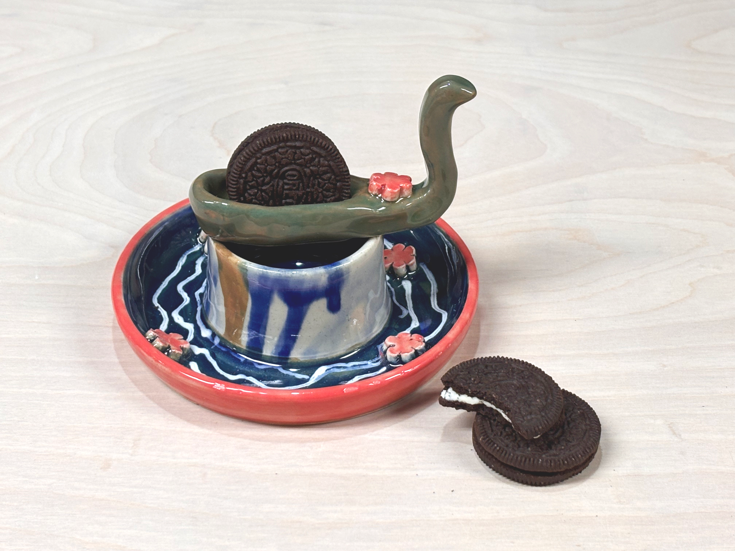 I designed a ceramic cookie spoon and a ceramic cookie pool