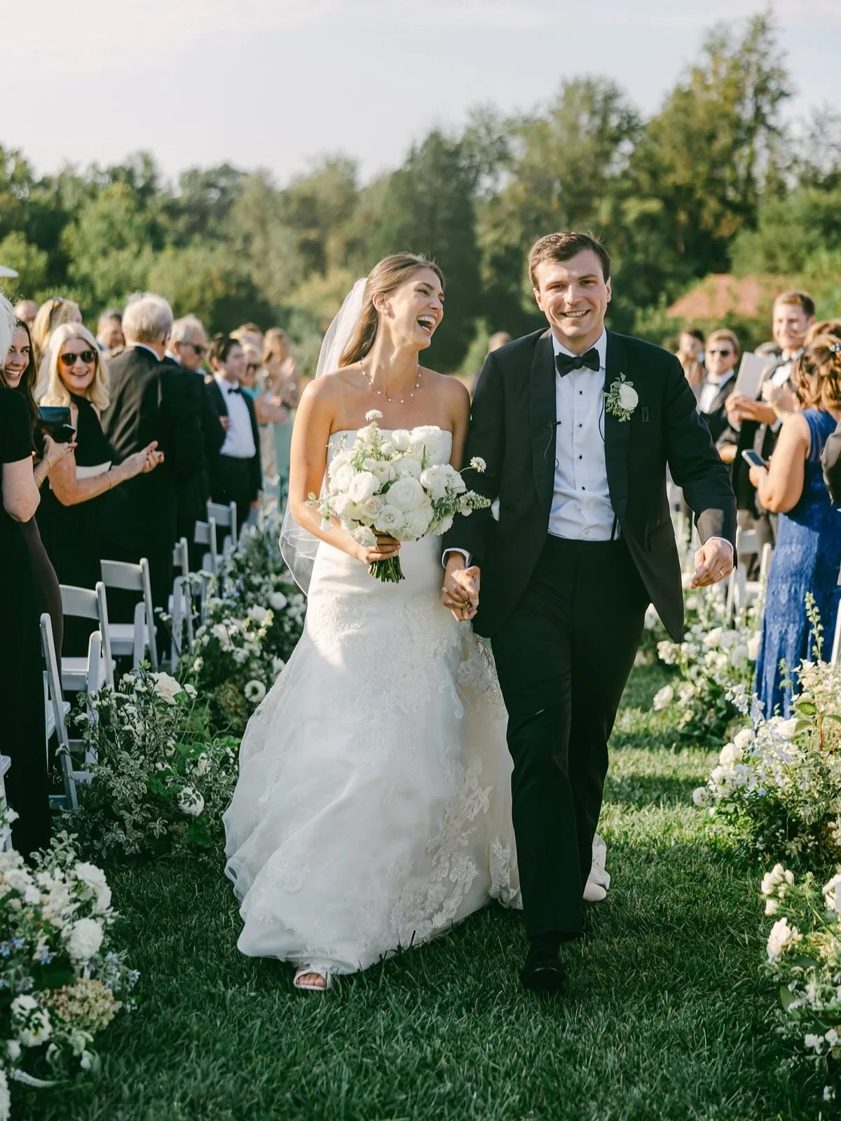 Green and white never goes out of style, especially when it looks like this. 

This ceremony design leaned into the timelessness of a green and white palette, shaped with an Old-World sensibility. Soft structure, delicate movement, and natural textur