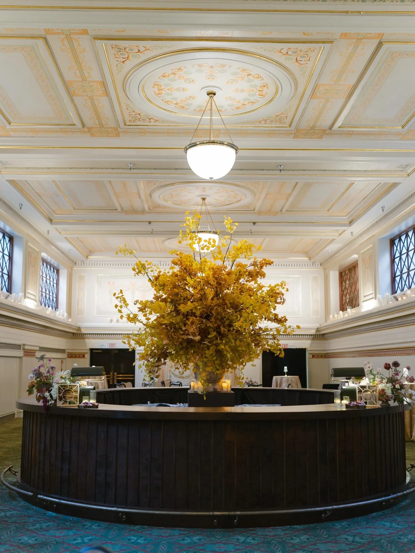 Cocktail hour sets the tone more than people realize.

It&rsquo;s where the room starts to shift, and the florals begin to take on a different presence. Larger, looser, a little more expressive. Designed to live within the movement of the space, not 