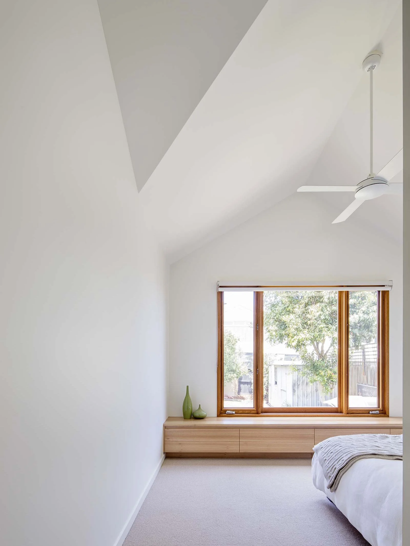 Lofty ceiling and fan over the main bedroom at gable house, Sandringham, by Sheri Haby Architects.