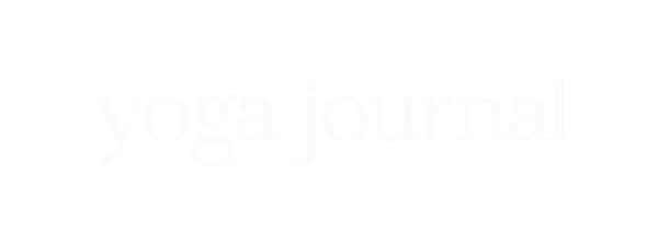 "Yoga Journal" logo in white text on a transparent background.