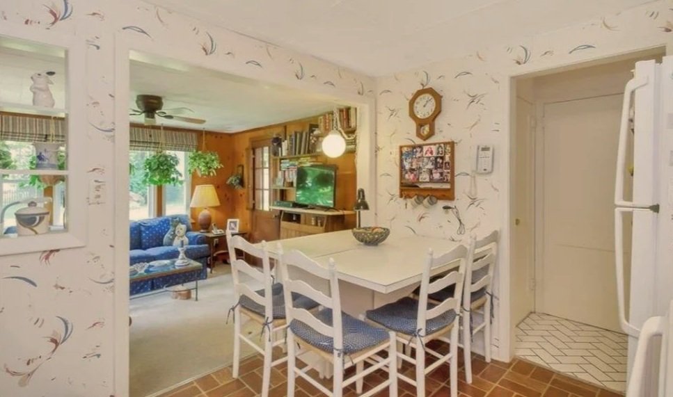 Before Renovation - The small den felt dark and disconnected from the rest of the house.