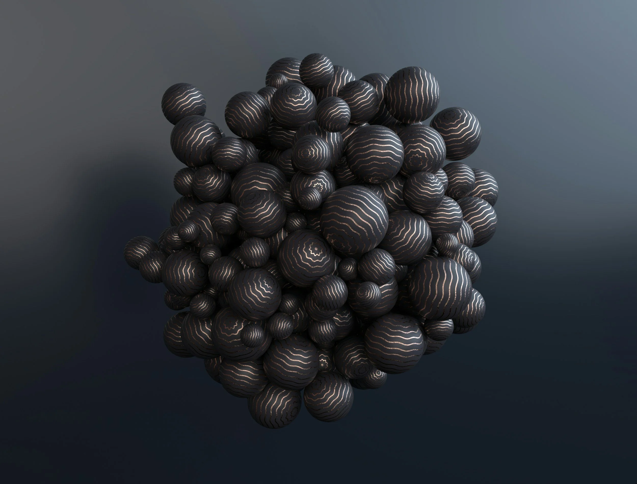Cluster of black spheres with gold and white wavy line patterns on a dark background