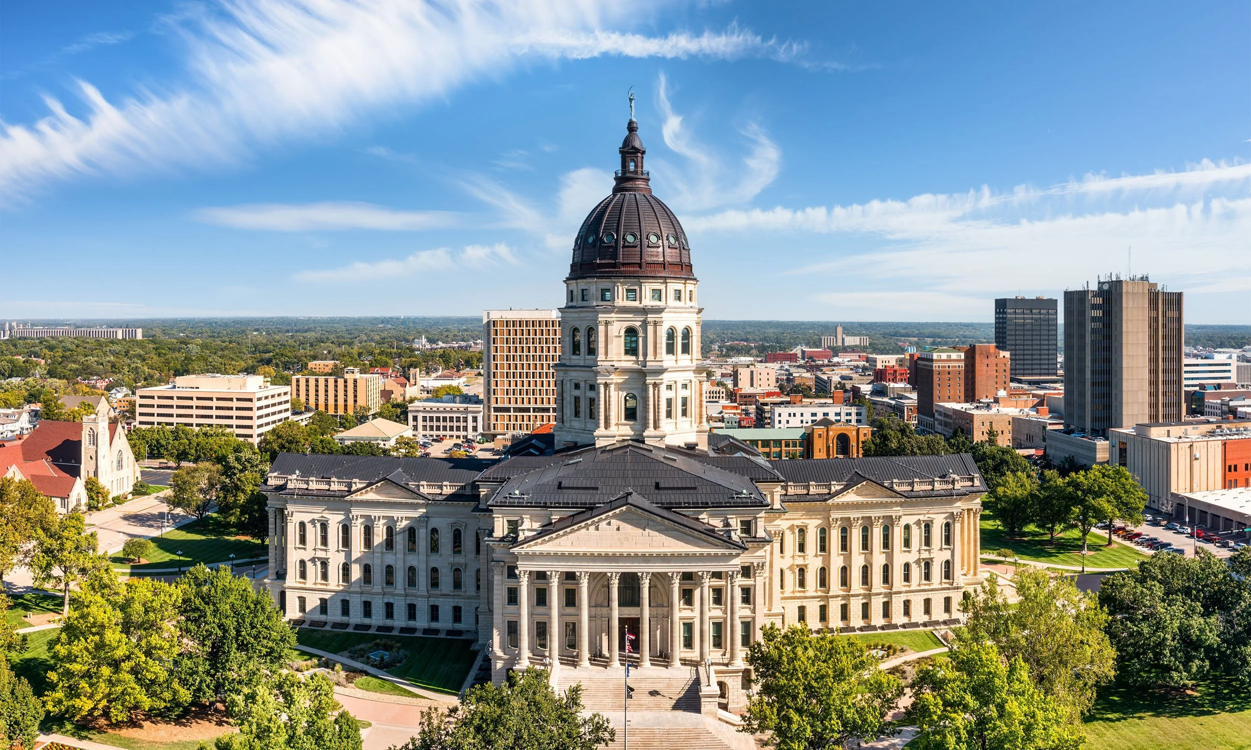 Kansas Senate narrowly passes budget, cell phone bill takes another turn