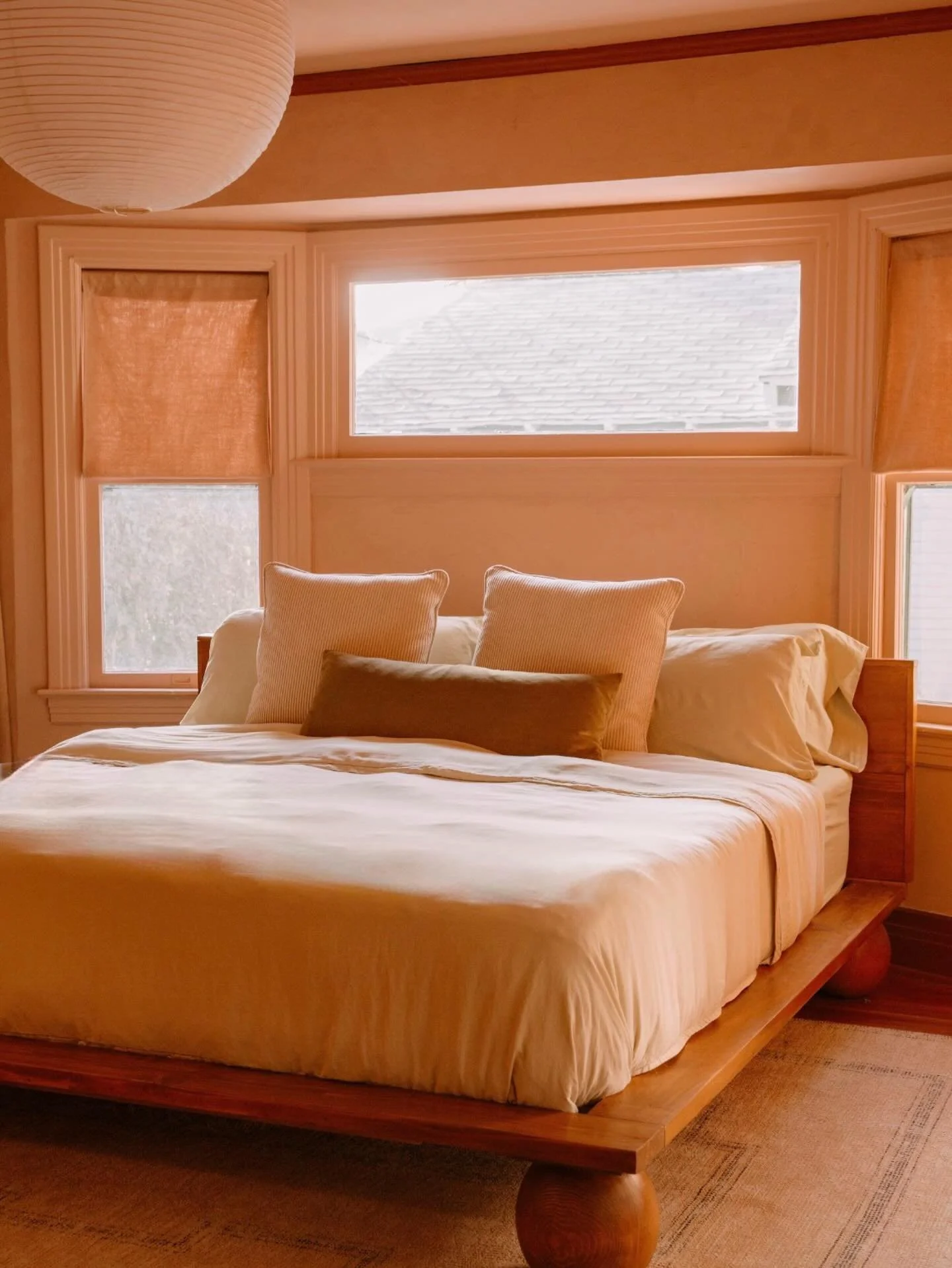 I would like nothing more than to crawl back into bed in our color-drenched cozy zone on this rainy Thursday. Color theory played an important role in designing this space, in that once I learned that dusty rose has the most calming chemical effect o