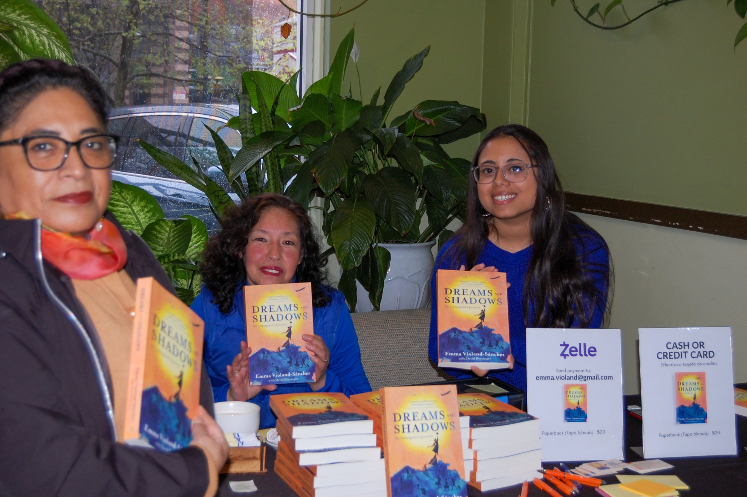 Arlington’s immigrant leaders helped sell books at the Bilingual Book Launch at Cafe Sazon - Cafe Sazón