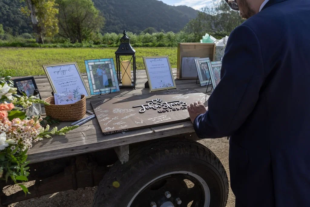 Personalized wedding guest book and remembrance display at Tar Creek Ranch