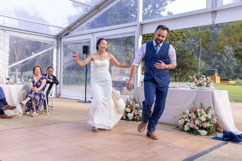 Newlyweds performing a lively choreographed dance at Tar Creek Ranch