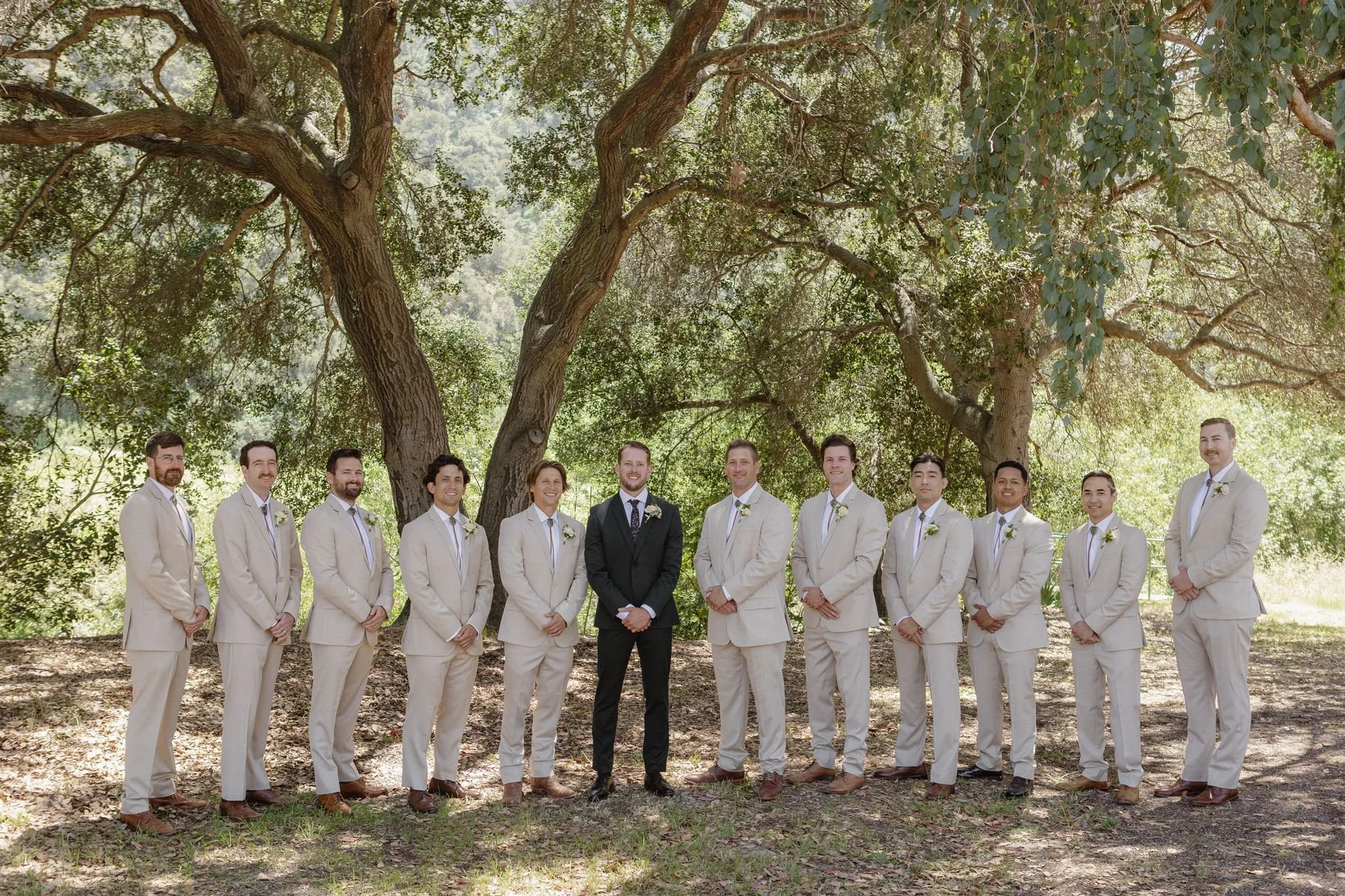 Connor and groomsmen in khaki suits at a Central Coast ranch wedding