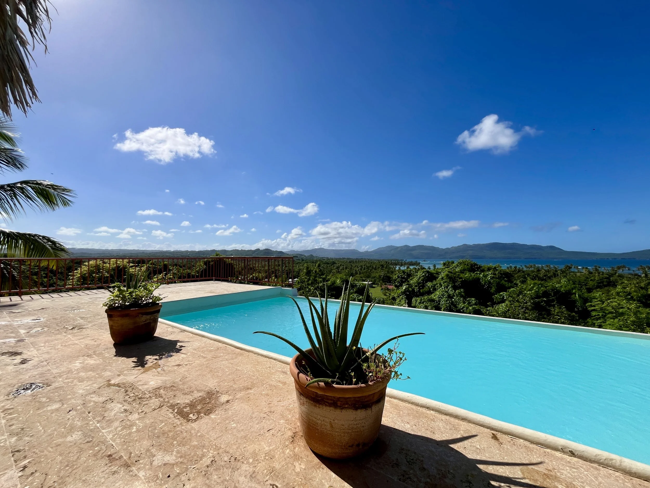 The terrace and the pool overlooking the Rincon bay.