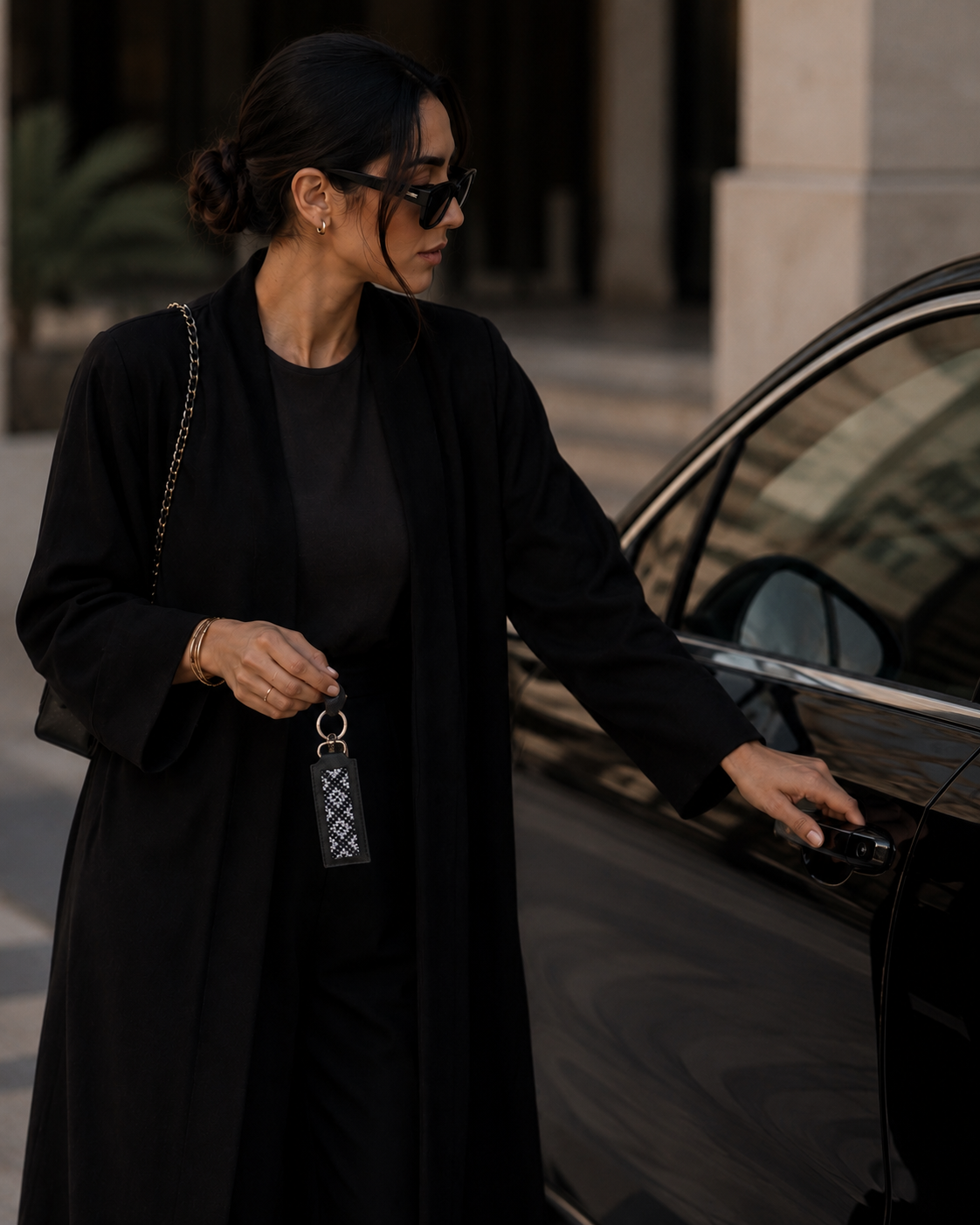 WOman holding Key Fob .png