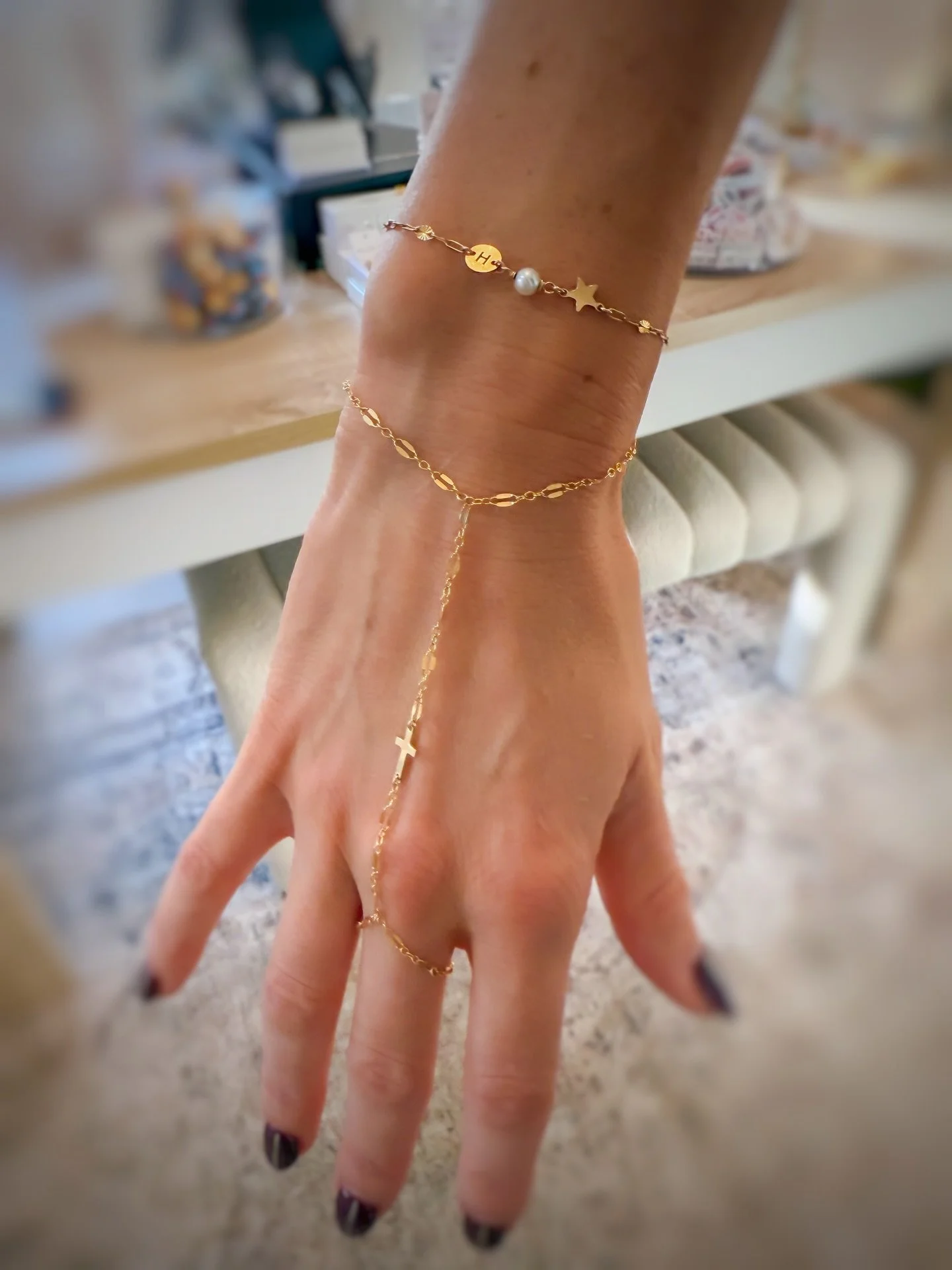 For the moms who do it all&hellip; and still want to feel a little sparkly. ✨

This custom 14k gold-filled hand chain was designed with meaning, a delicate cross connector and a magnetic clasp so she can wear it daily or remove it when mom life gets 