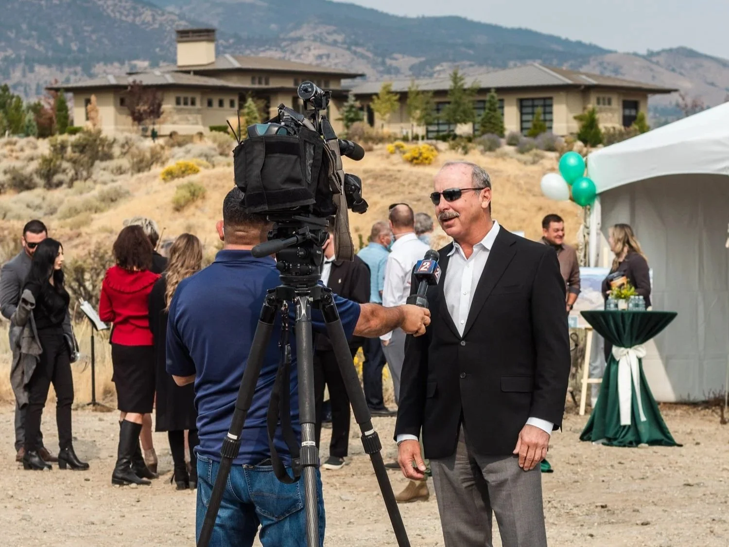A man being interviewed for local PR at an event in Reno, Nevada.