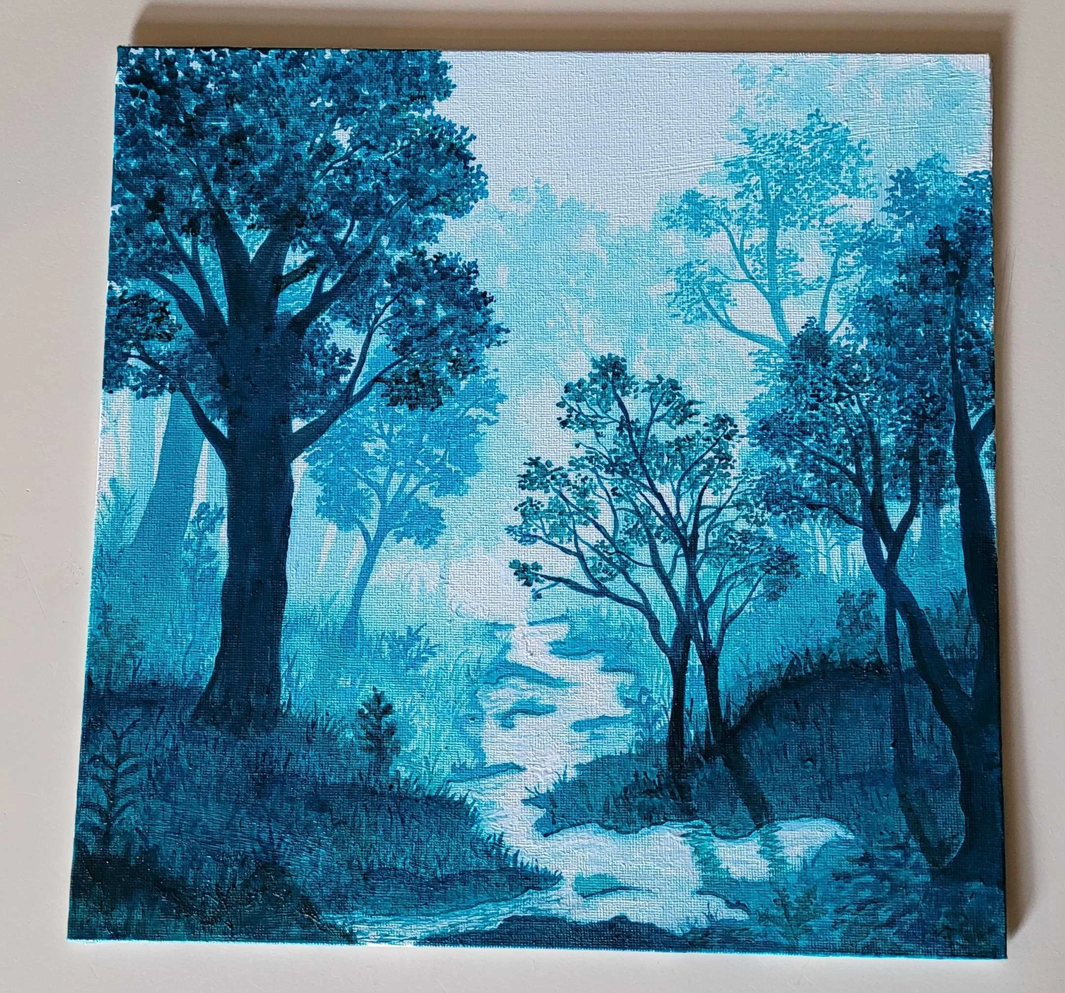 A painting of a tranquil forest scene with tall trees and a winding river in shades of blue-green.