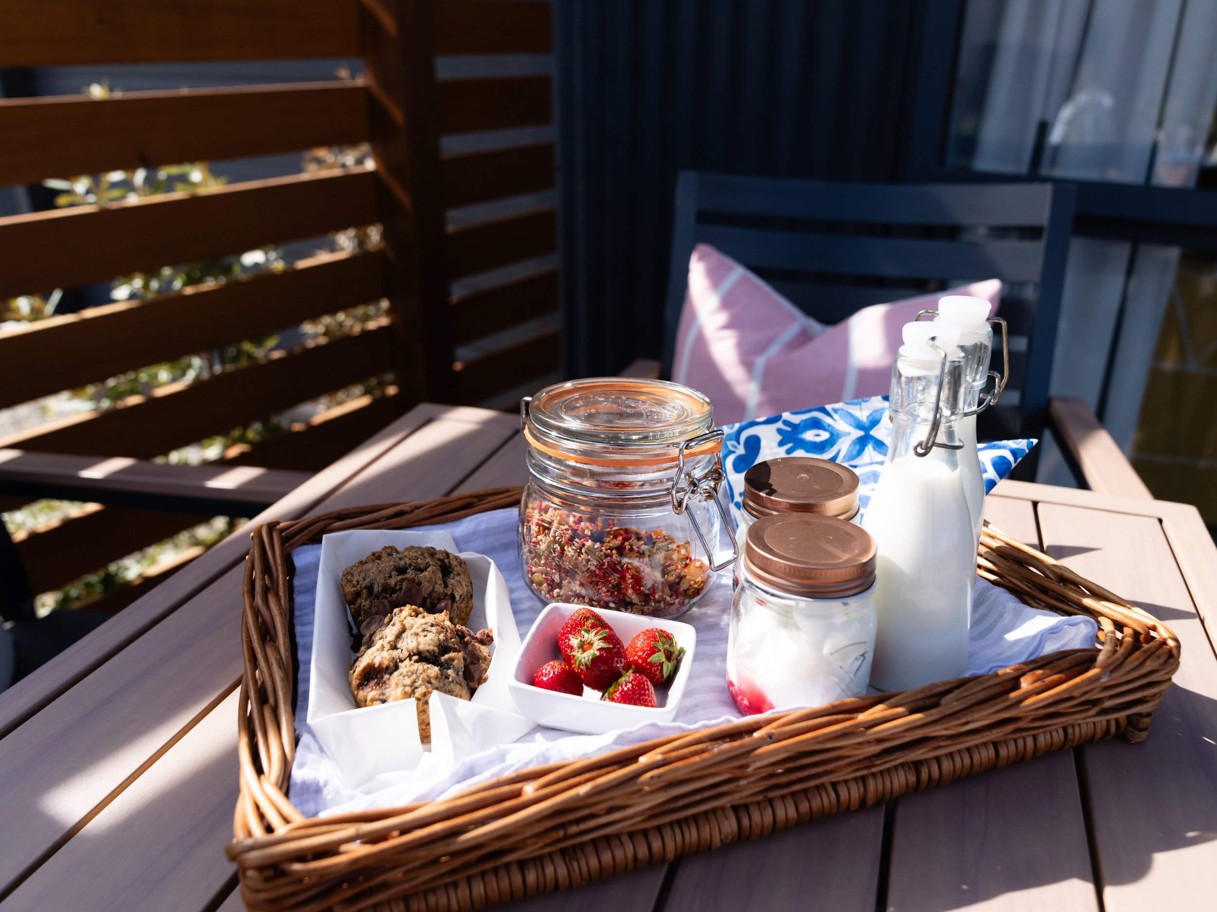 Provisioned breakfast of toasted muesli, home-baked muffins, yoghurt fruit pots and fresh fruit