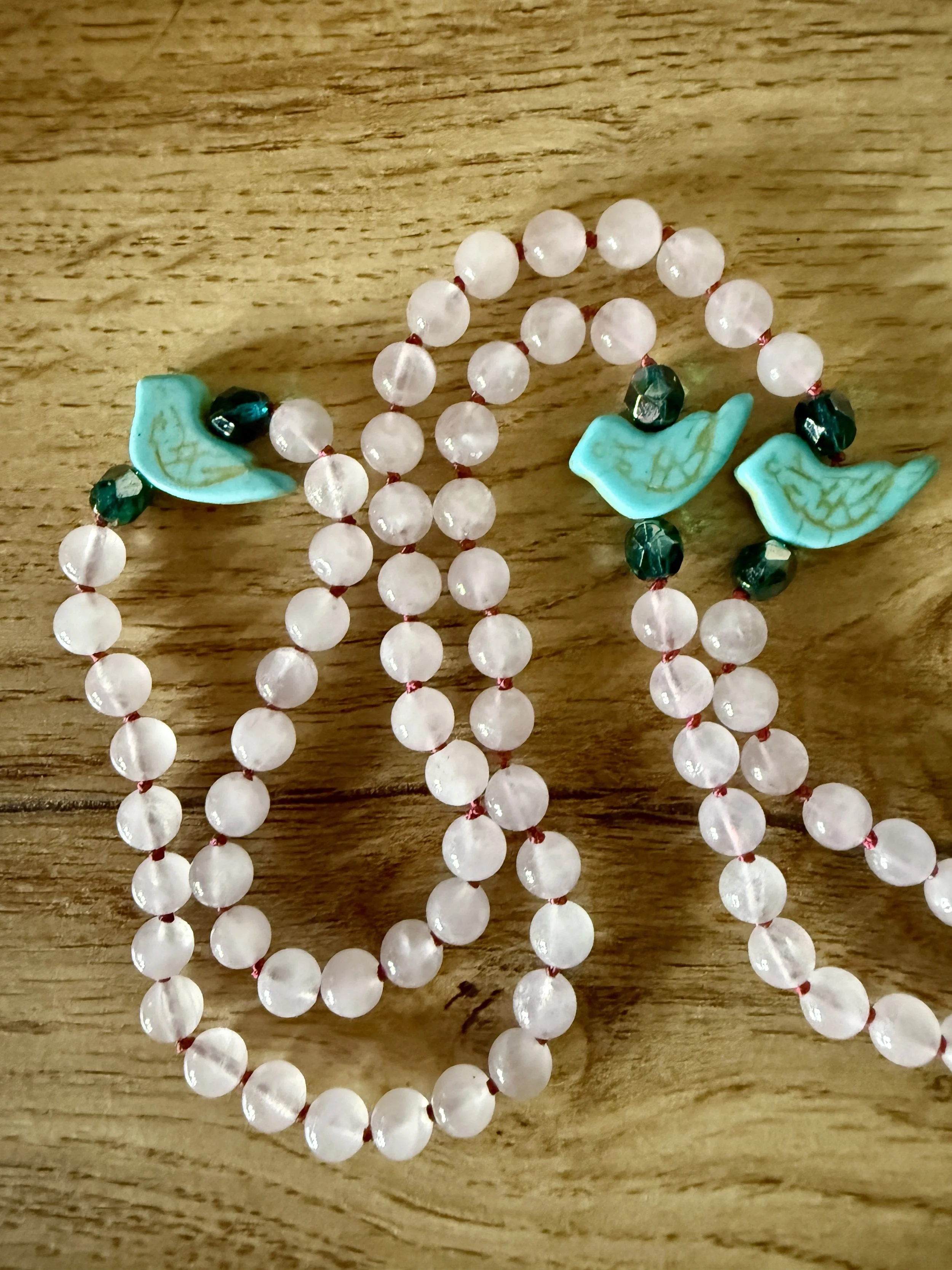 rose quartz rhodonite beads bird pendant.jpg