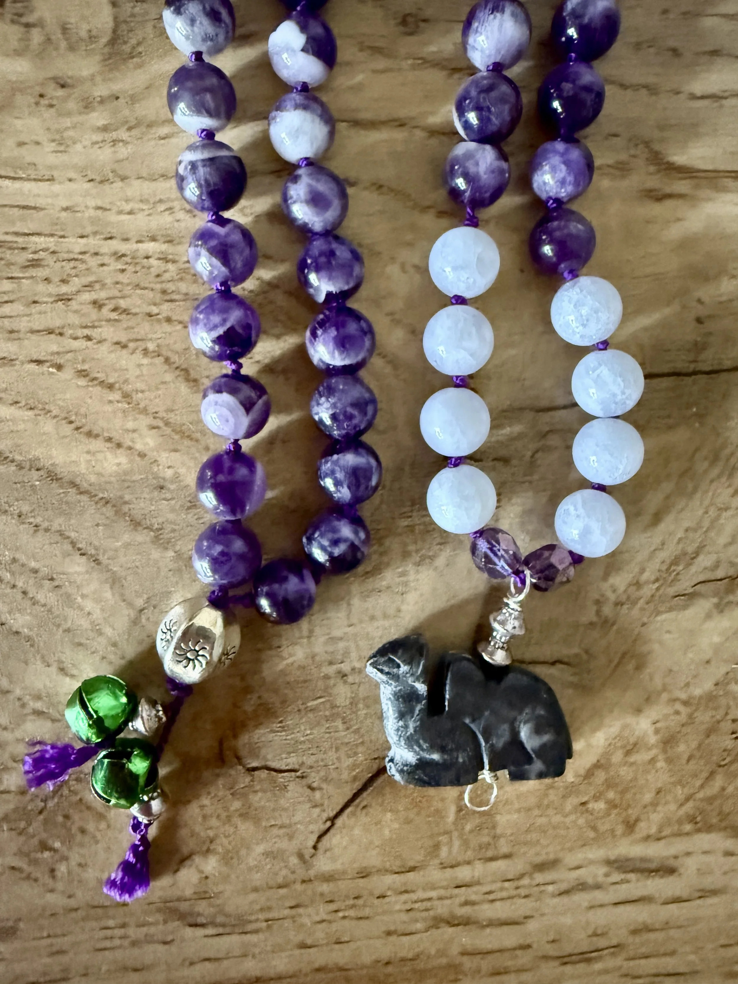 purple beads jingle bells camel pendant.jpg
