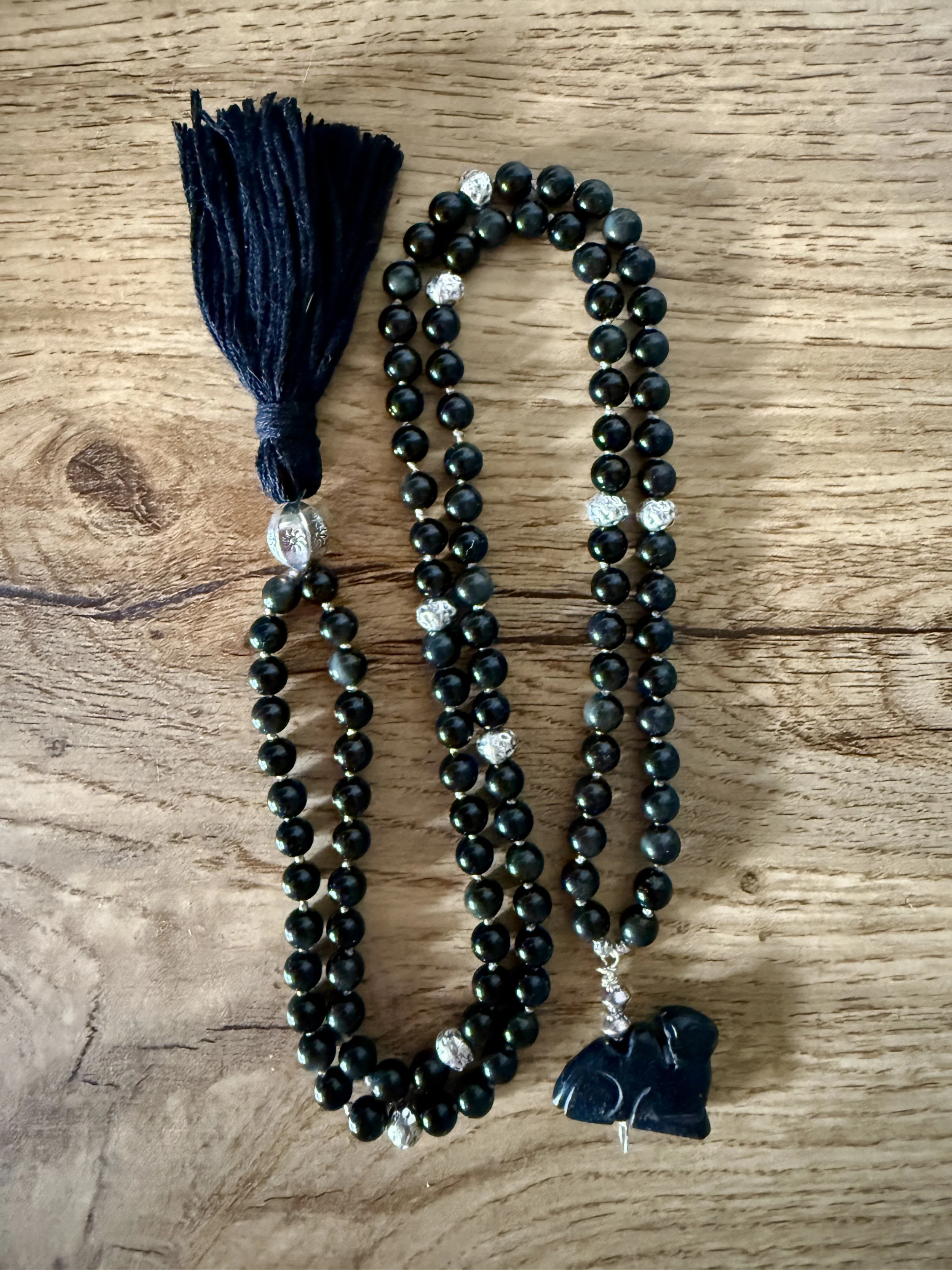 Obsidian with black stone camel 1.jpg