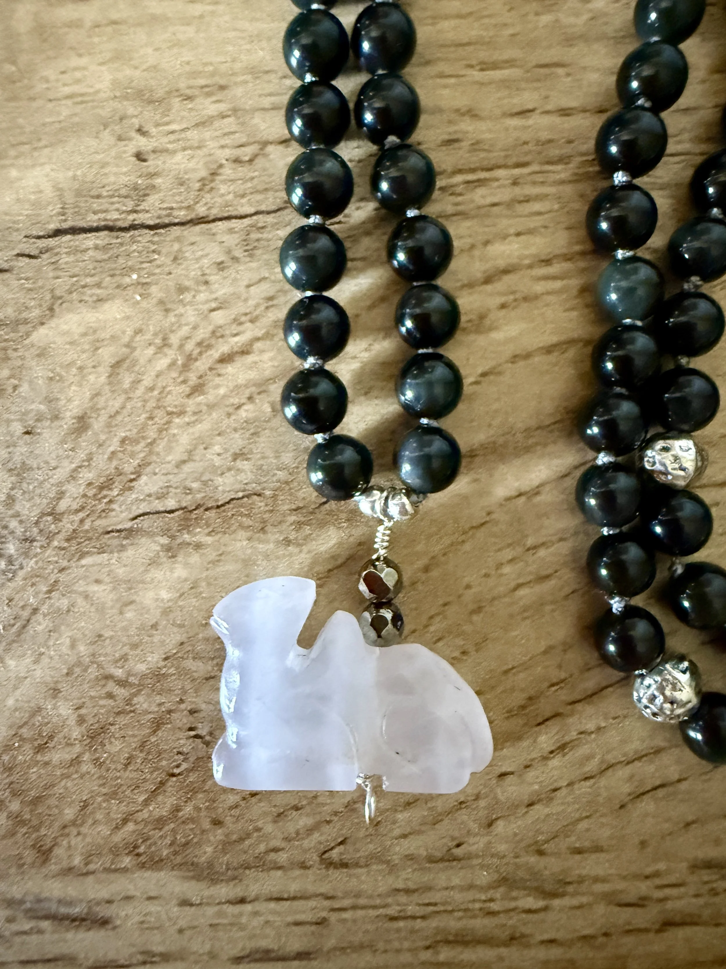Obsidian with Rose Quartz camel.jpg