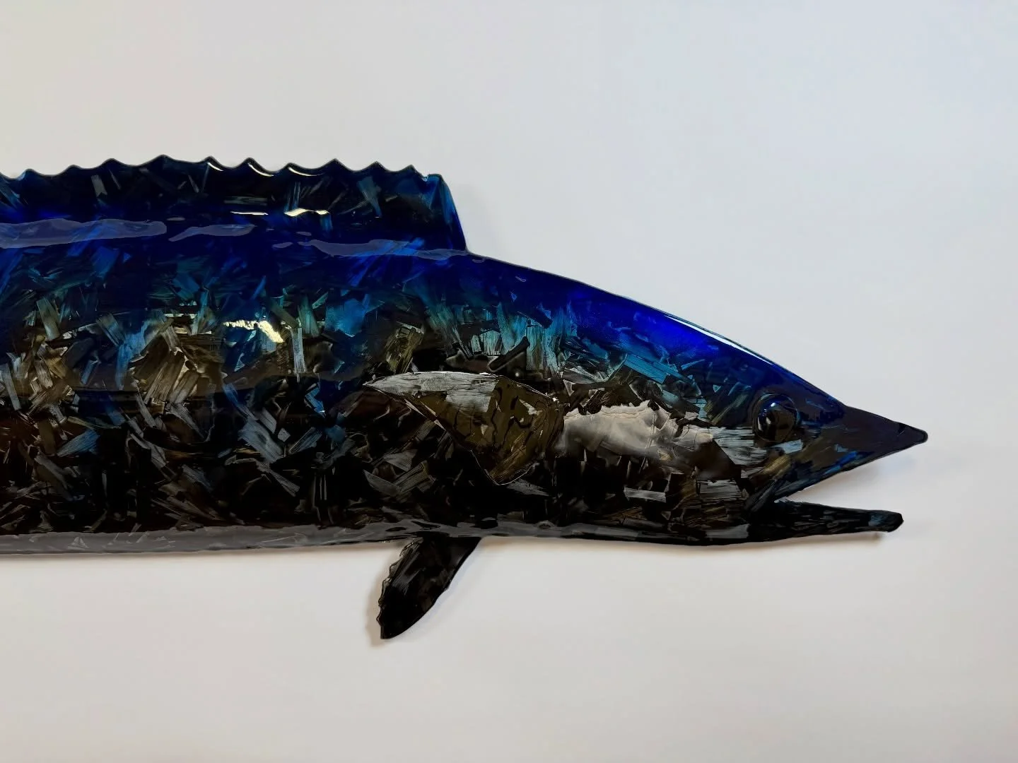 Built for Speed&hellip; Forged Carbon Wahoo wall sculpture. Third addition to the Carbon Opus Series. 

Carbon Opus Series - Work 3 
Carbon Wahoo 
Dimensions: 45&rdquo;x12&rdquo;x3.5&rdquo;
Materials: Stainless steel, hand laid forged carbon, candies