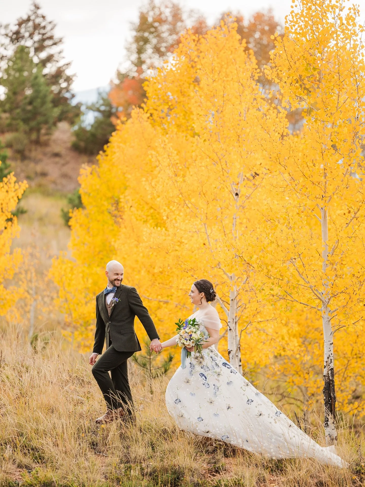 The autumn leaves sure showed off for E&amp;H!

Photography: @katiefletcher_photography
Coordination: @withgraceplanning
Venue: @pikespeakranch
Catering: @buffalogalsgrilling
Dessert: @thecutecakesandbakes
Bar: @partyliquorco
DJ: @thentertainme
Hair 