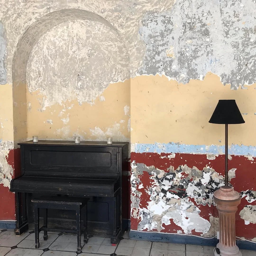 Valladolid &mdash; Study I

Interior / Piano

In Valladolid, walls carry time in layers.

Pigments fade.
Plaster opens.
Earlier colours surface beneath the present.

A piano rests quietly against the wall &mdash;
sound waiting inside a room marked by