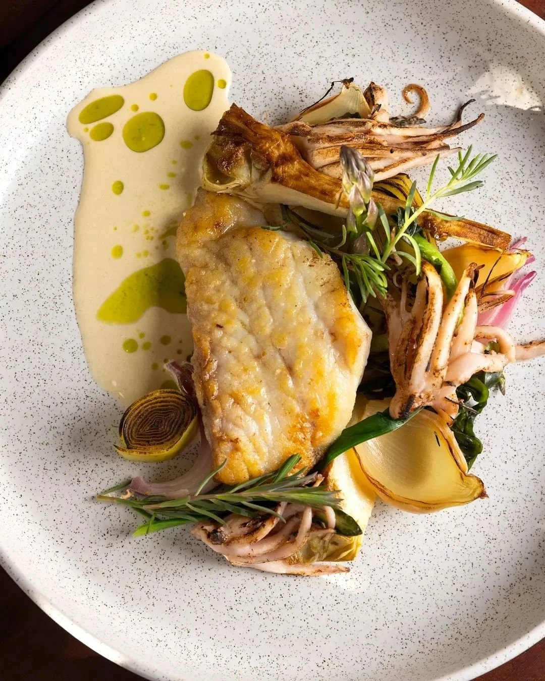 Roast market fish &amp; charred Abrolhos squid, buttermilk seafood broth