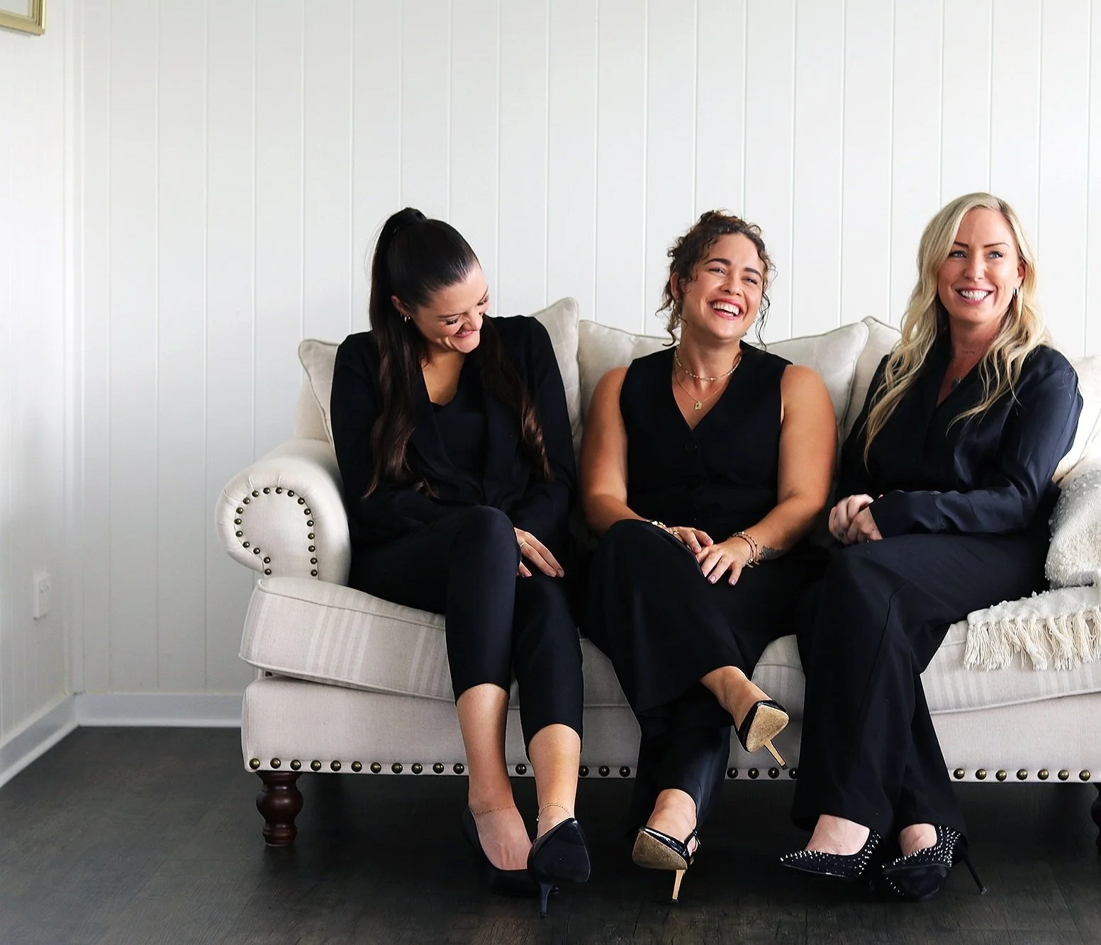 Award-winning Sunshine Coast + Cairns mortgage broker Tara Rockett with the Rockett Finance Solutions team