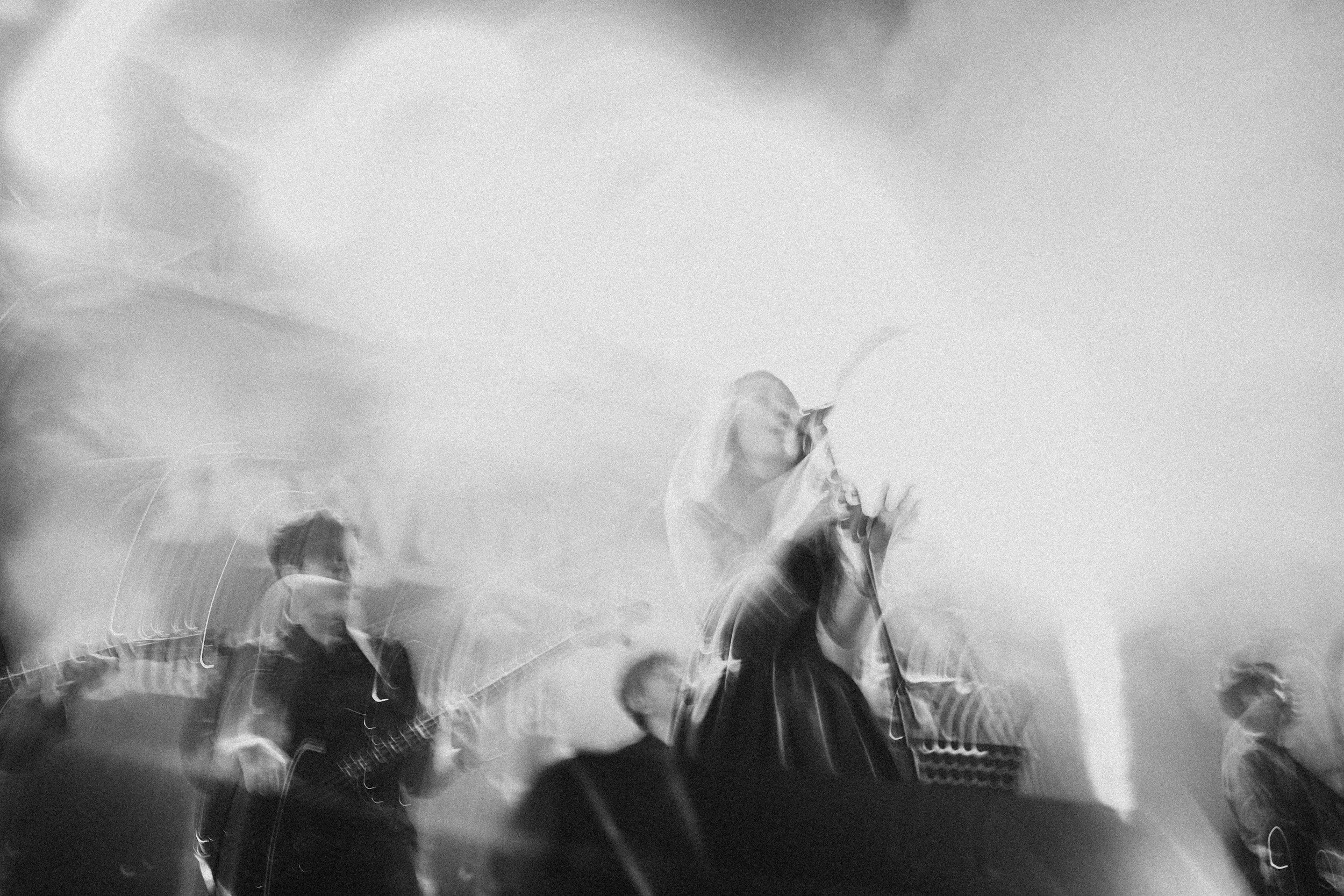 A band performing onstage confidently due to mindset tools.