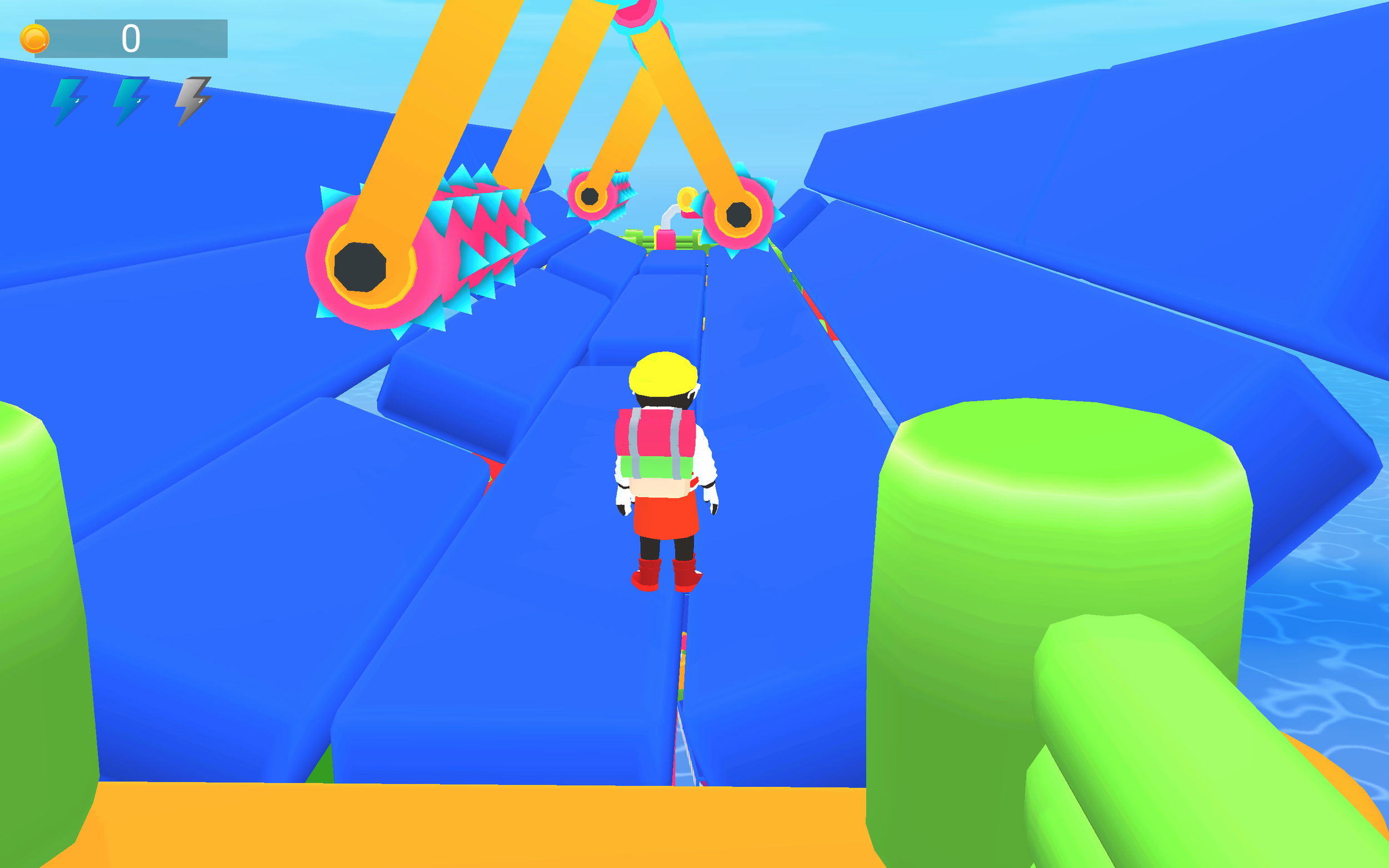A colorful 3D video game scene with a character standing on a platform made of blue blocks, surrounded by large green and orange cylindrical structures, and facing a series of yellow mechanical arms with spiked gears at the end, over the water in the background.