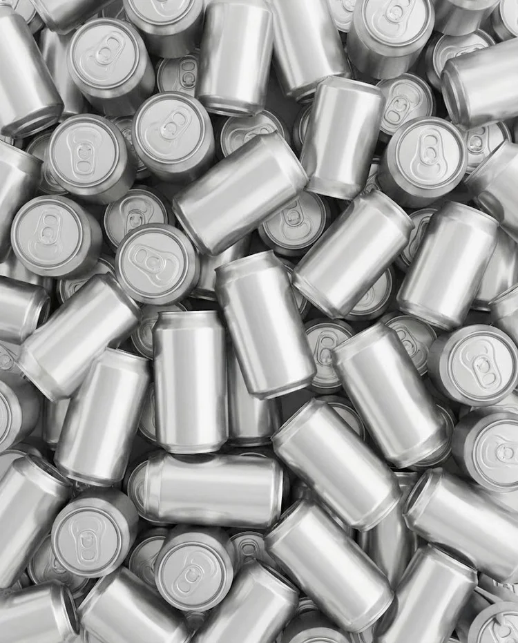 Silver aluminum beer cans viewed from above in a tight grid