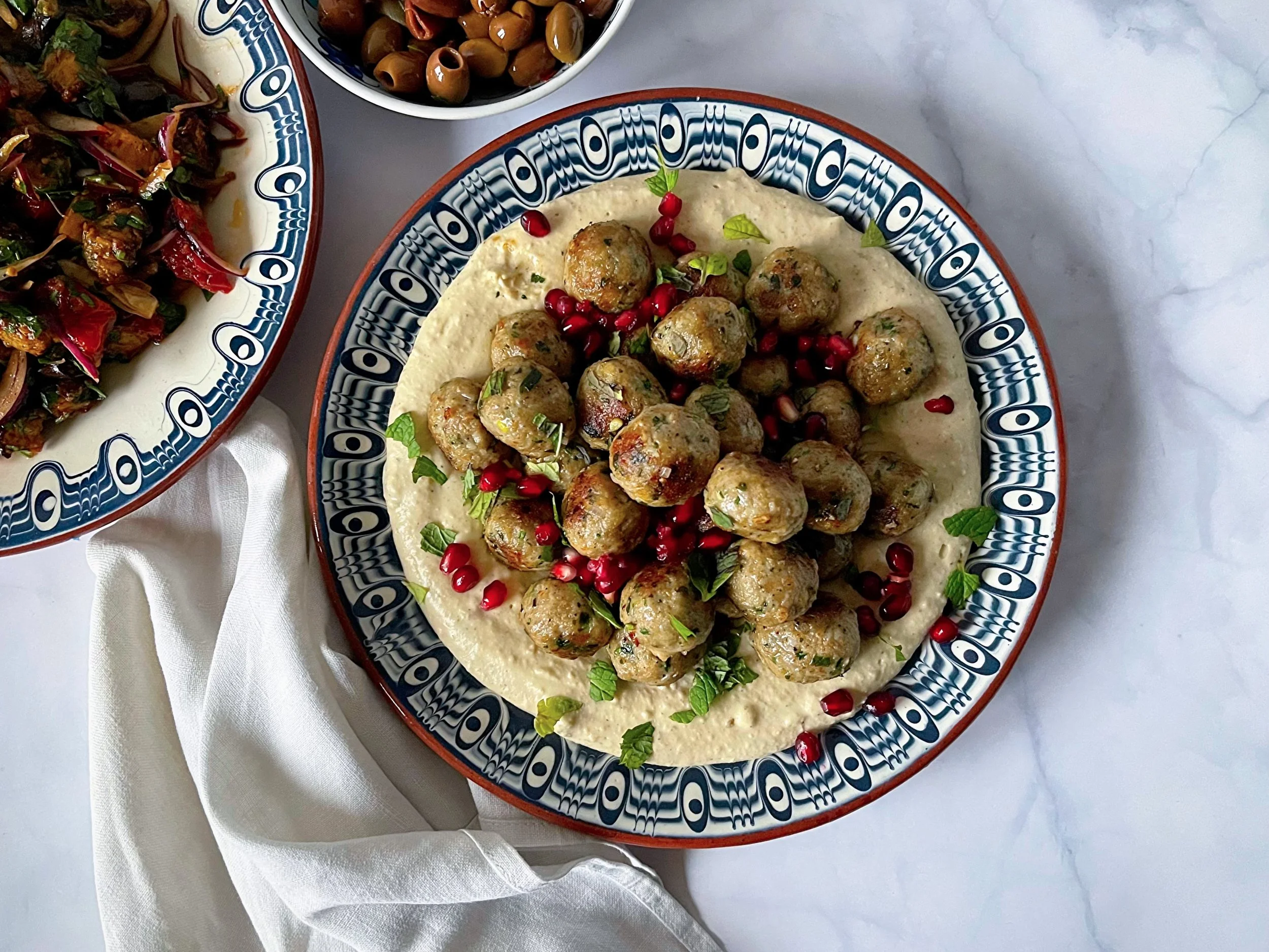 Boulettes d’agneau, crème de haricots blancs au citron confit