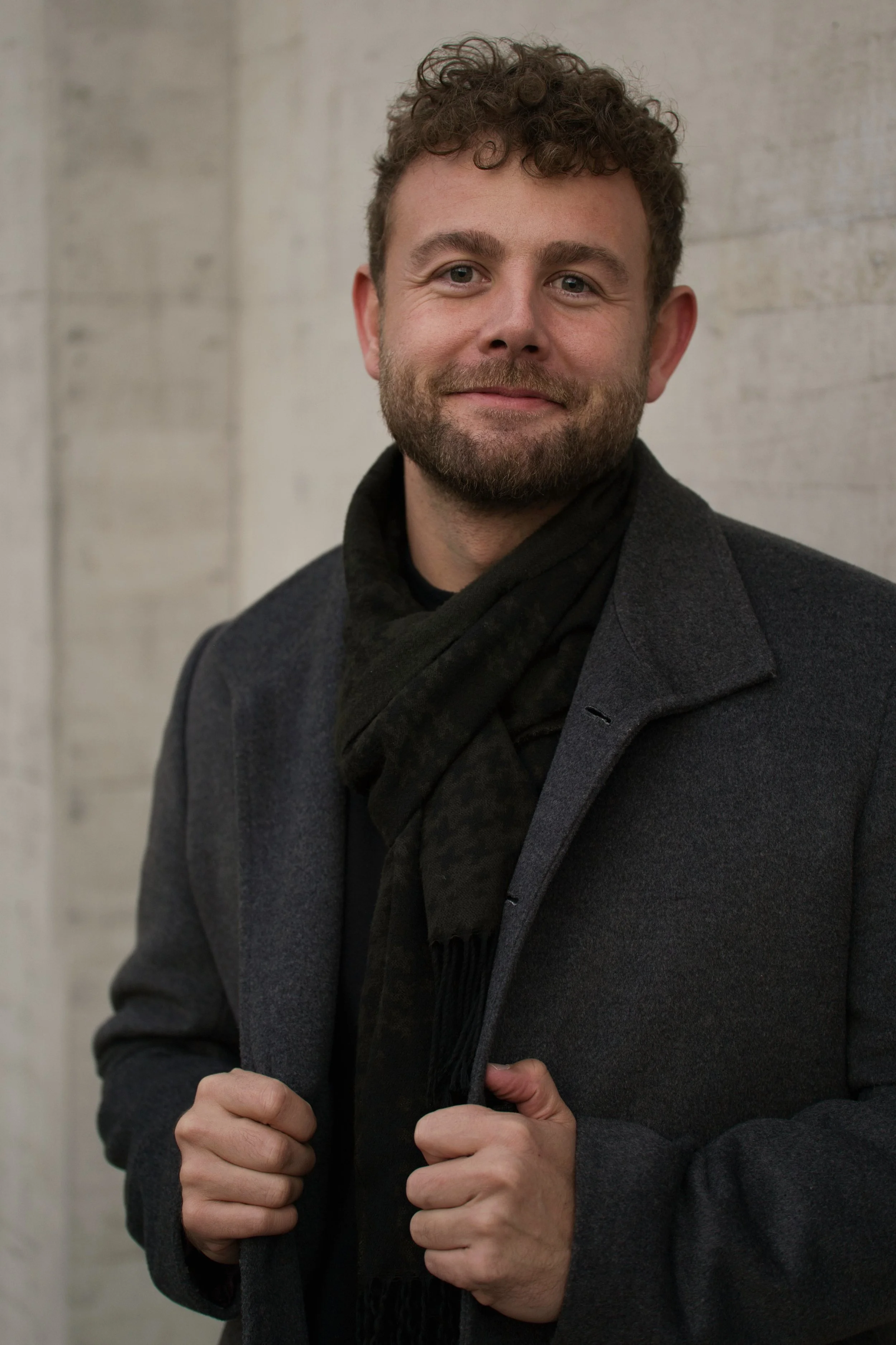 Portrait of Dario Caduff, a professional photographer based in Steckborn and Zurich. Known for his cinematic style in actor headshots and modern architecture photography.